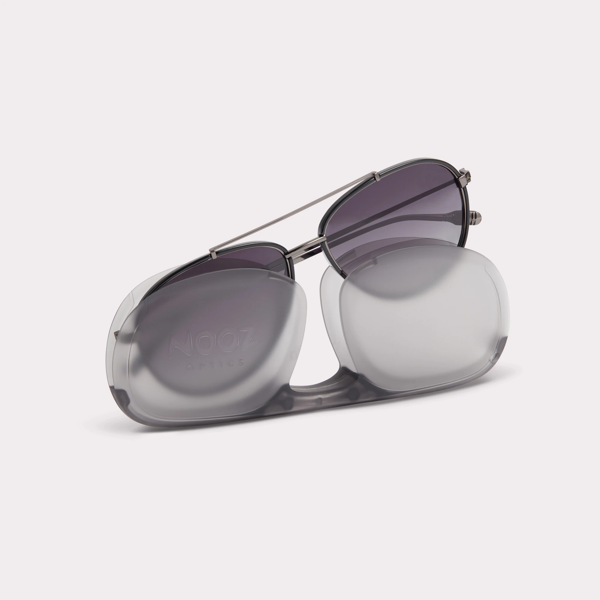 A pair of Jet Black Sunglasses coming out of its case