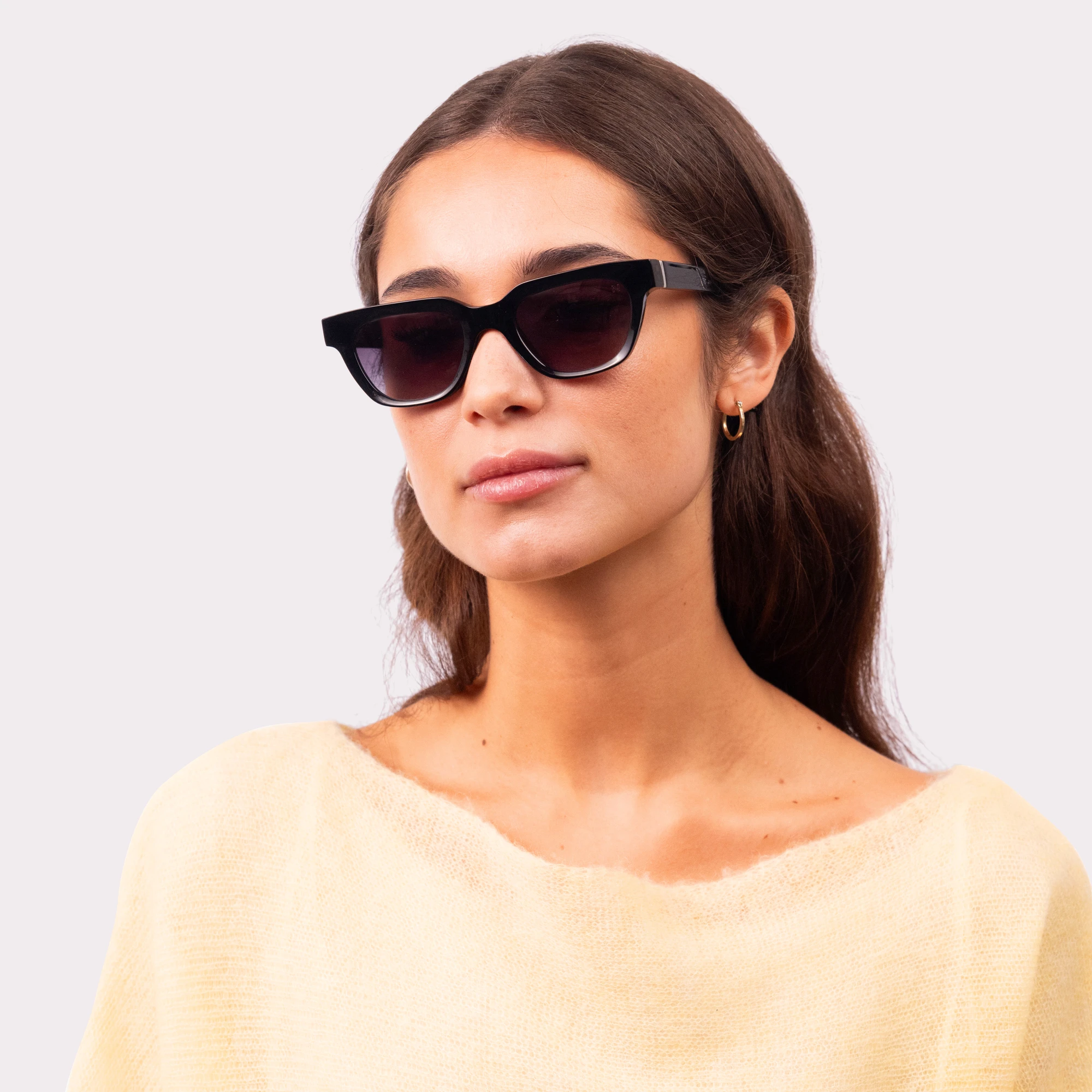 A pair of Eli Black Sunglasses