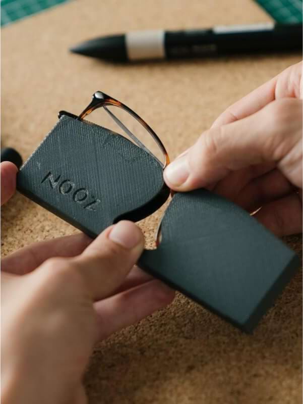 NOOZ OPTICS glasses in its transportation case