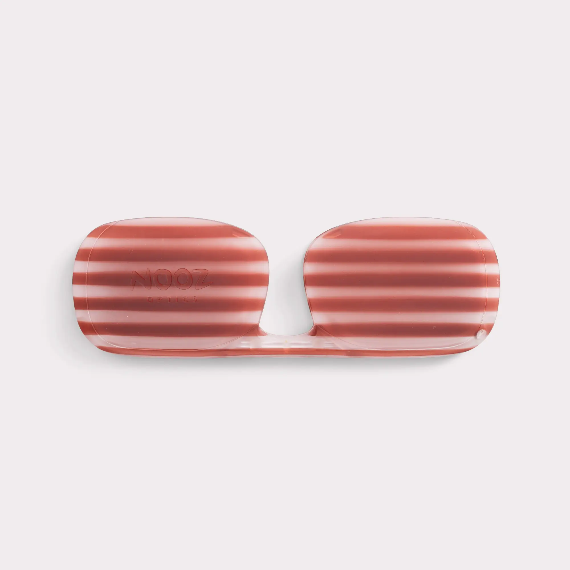 A pair of Case - Ivy Essential Demi-Red Accessories coming out of its case