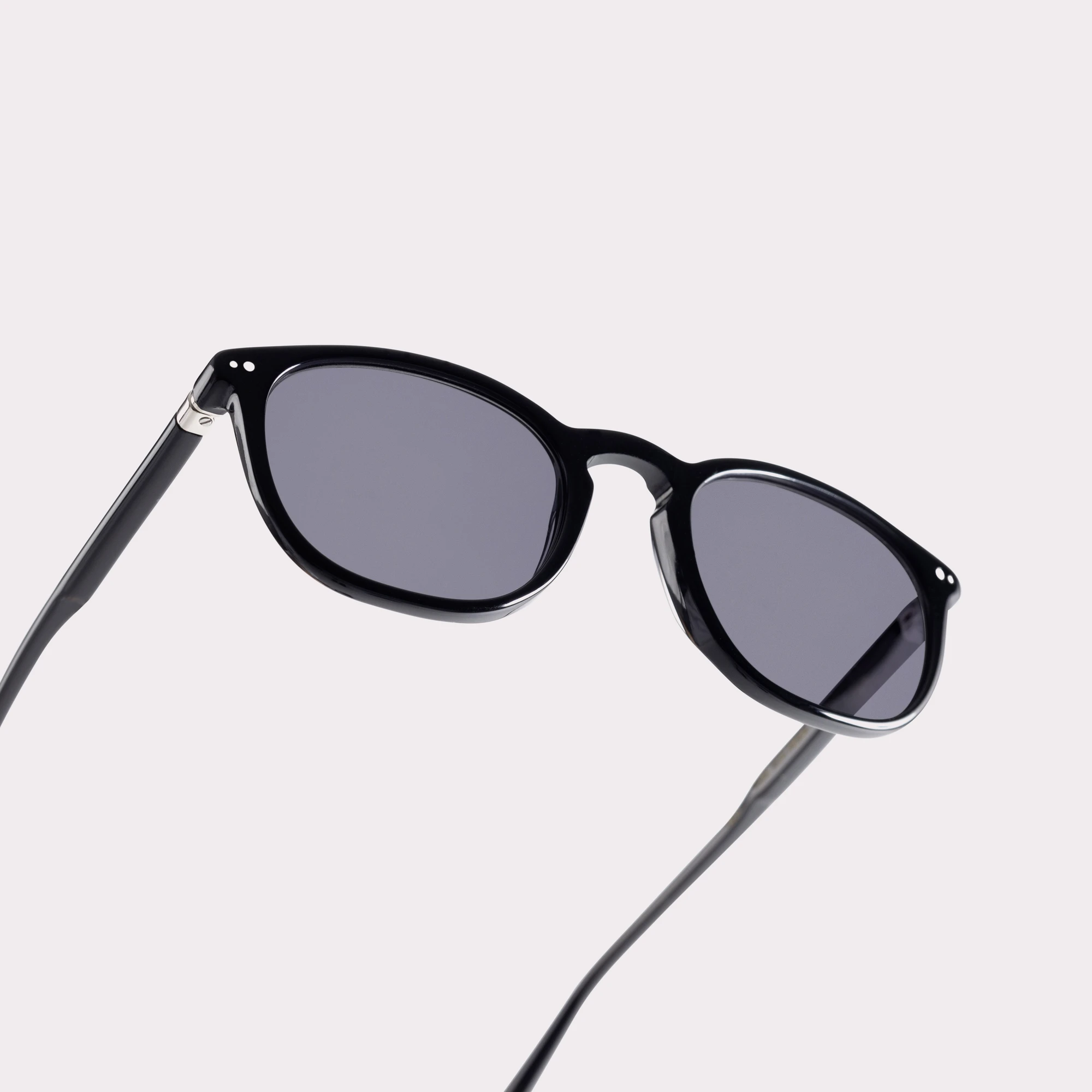 A pair of Roy Black Sunglasses in a macro view