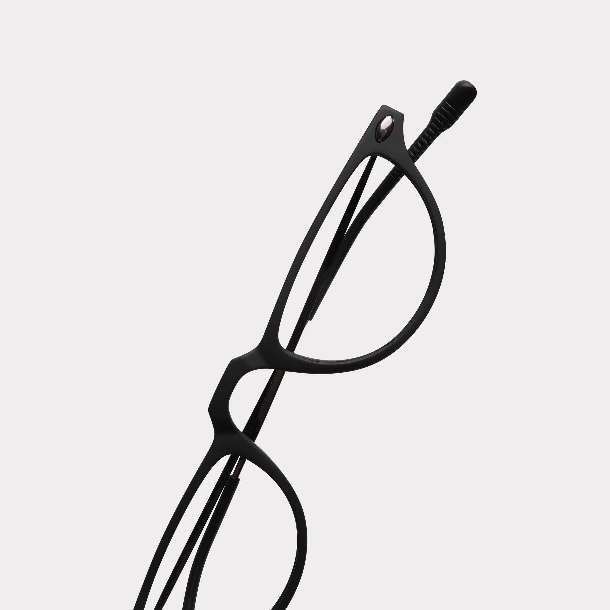 A pair of Moon Black Reading glasses in a macro view