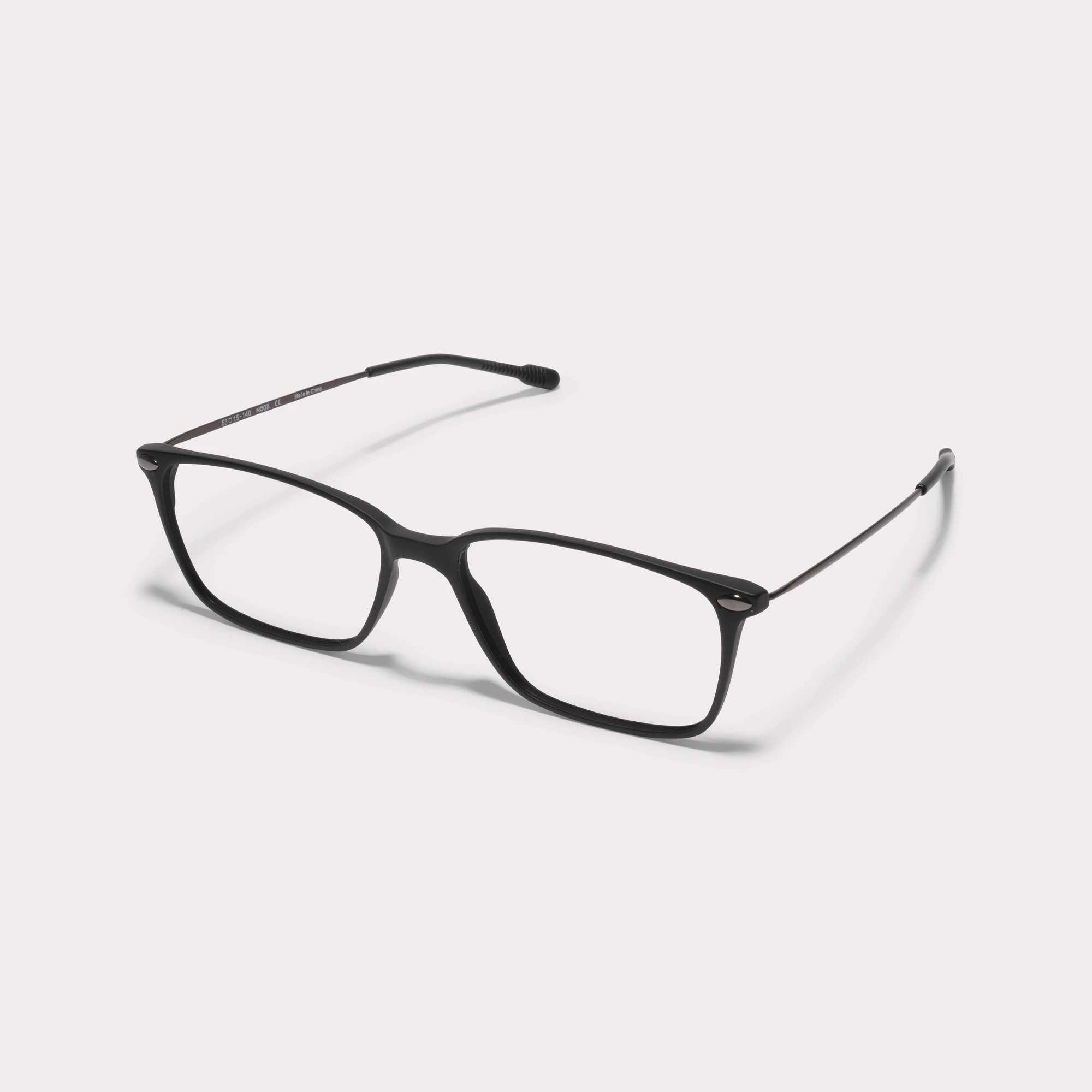A pair of Bao Black Reading glasses  seen from the side