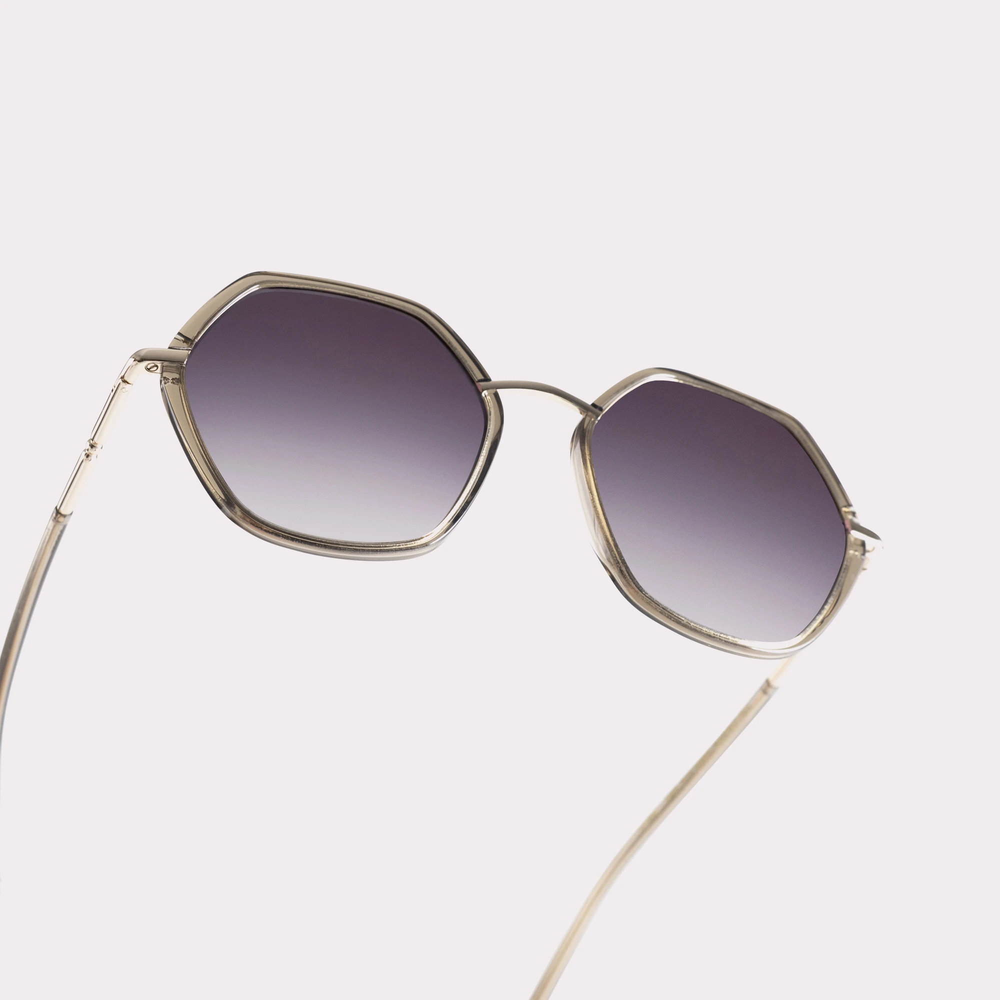 A pair of Pearl Olive Sunglasses in a macro view