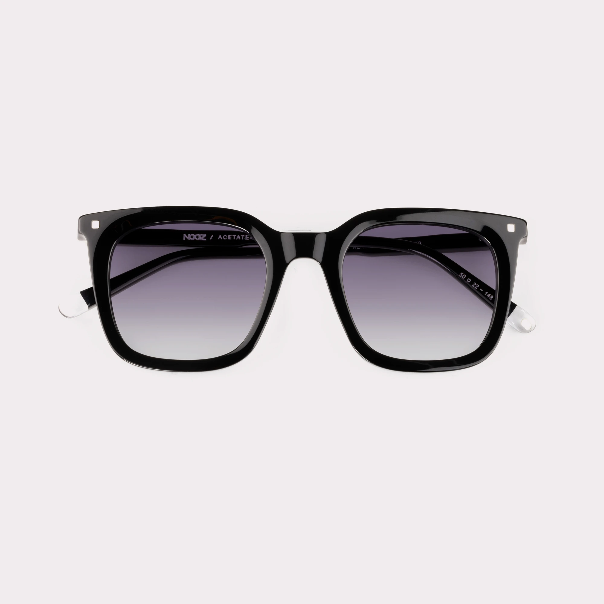 A pair of Candid Black Sunglasses folded