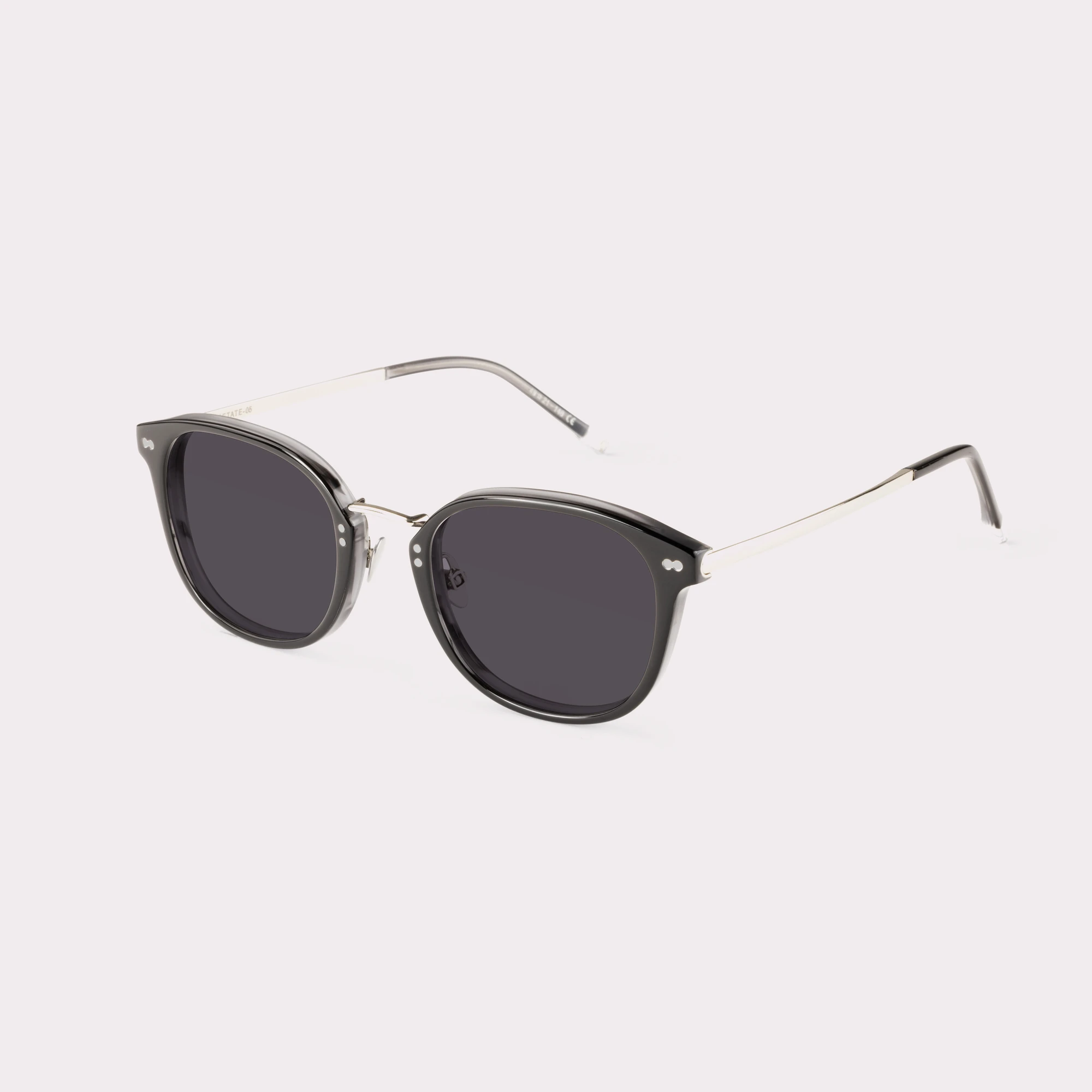 A pair of Covell Black Sunglasses  seen from the side