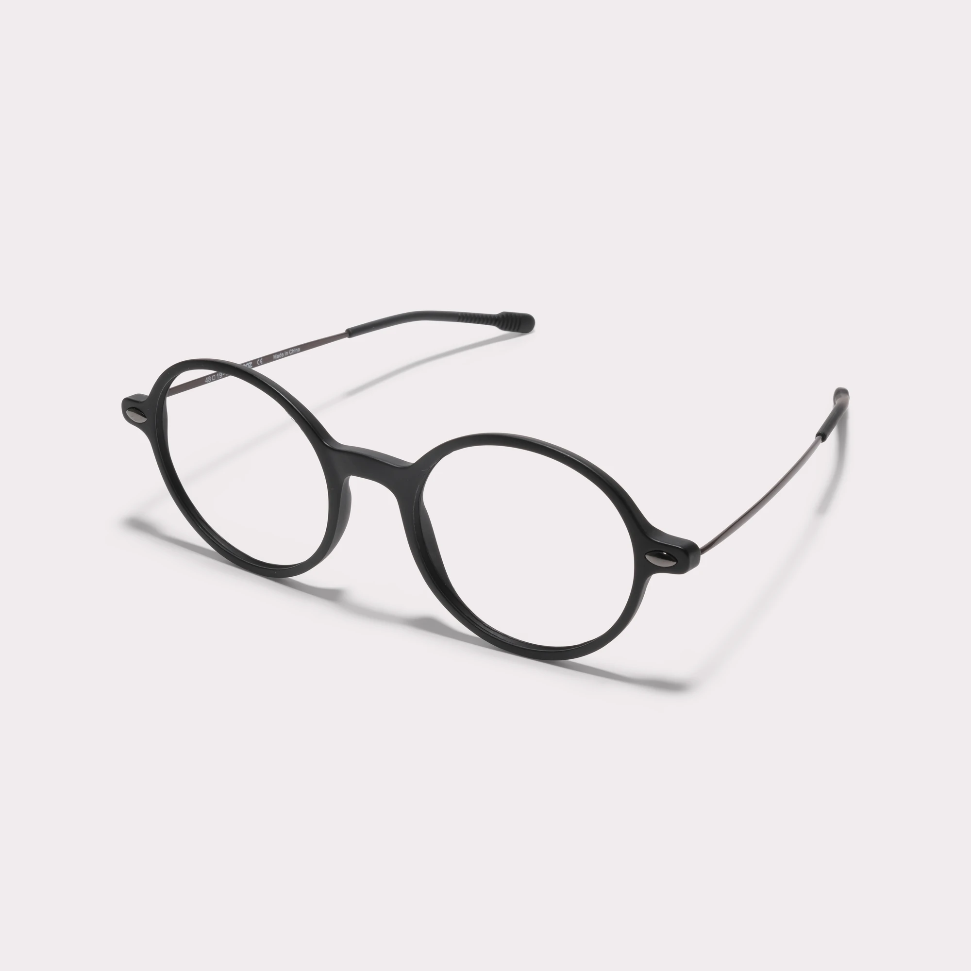 A pair of Milo Black Reading glasses  seen from the side