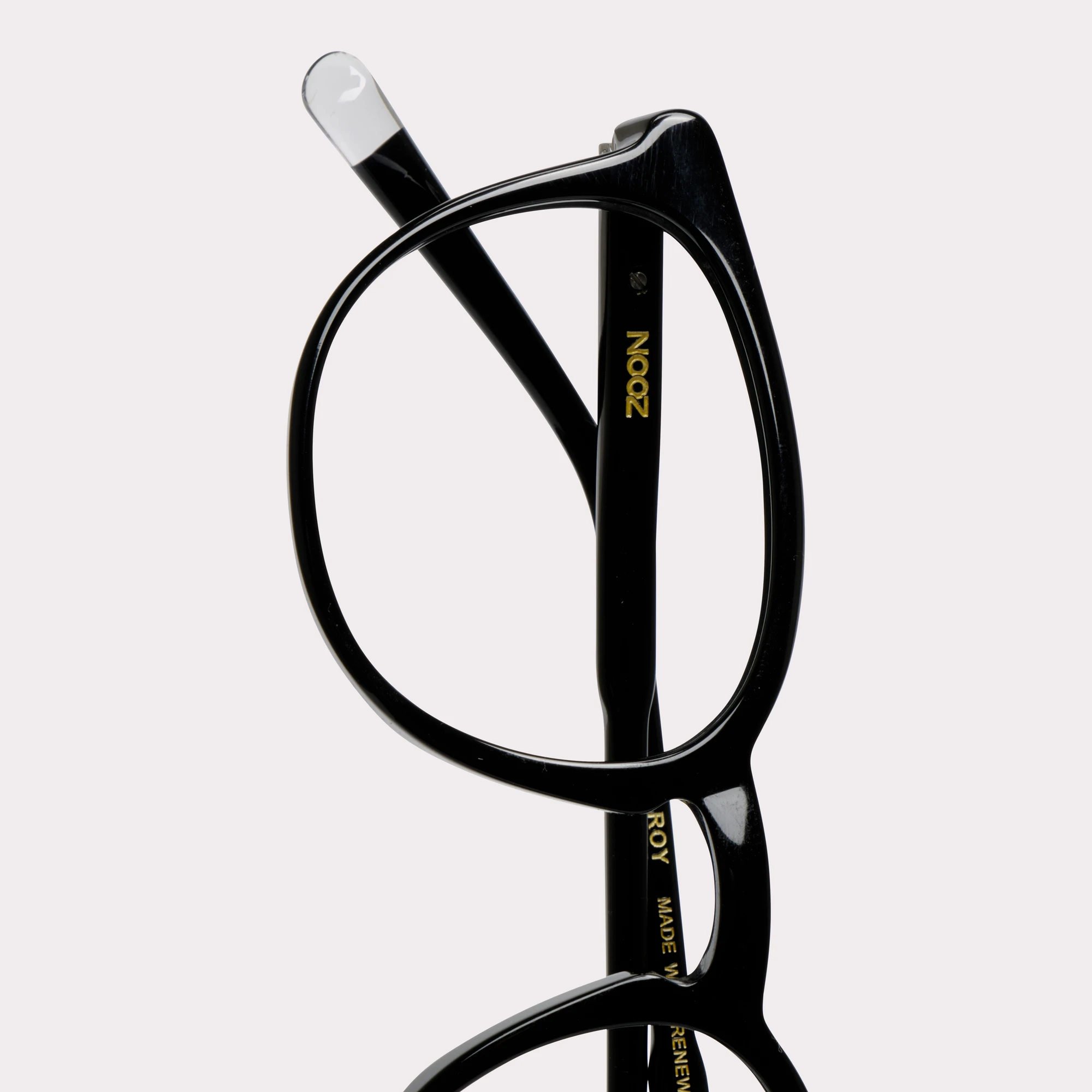 A pair of Roy Black Prescription glasses in a macro view