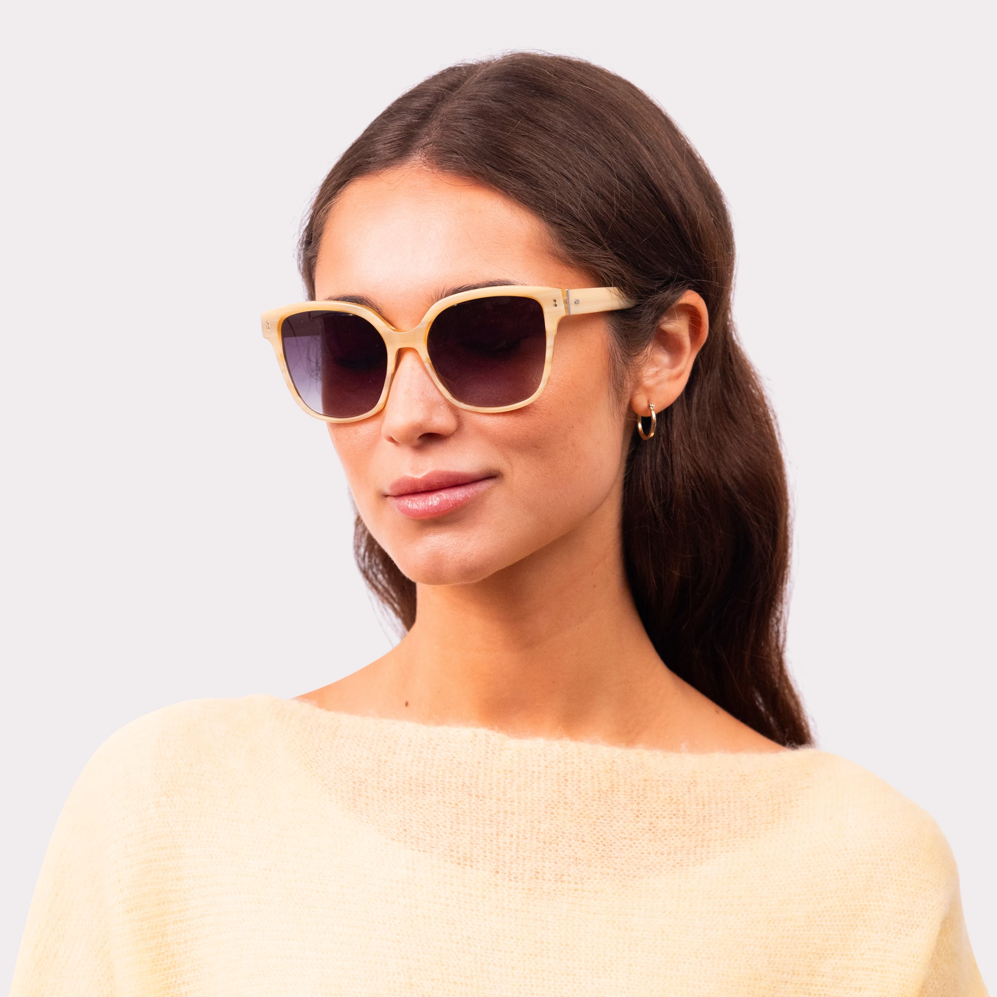 A pair of Lucky Milky Beige Sunglasses