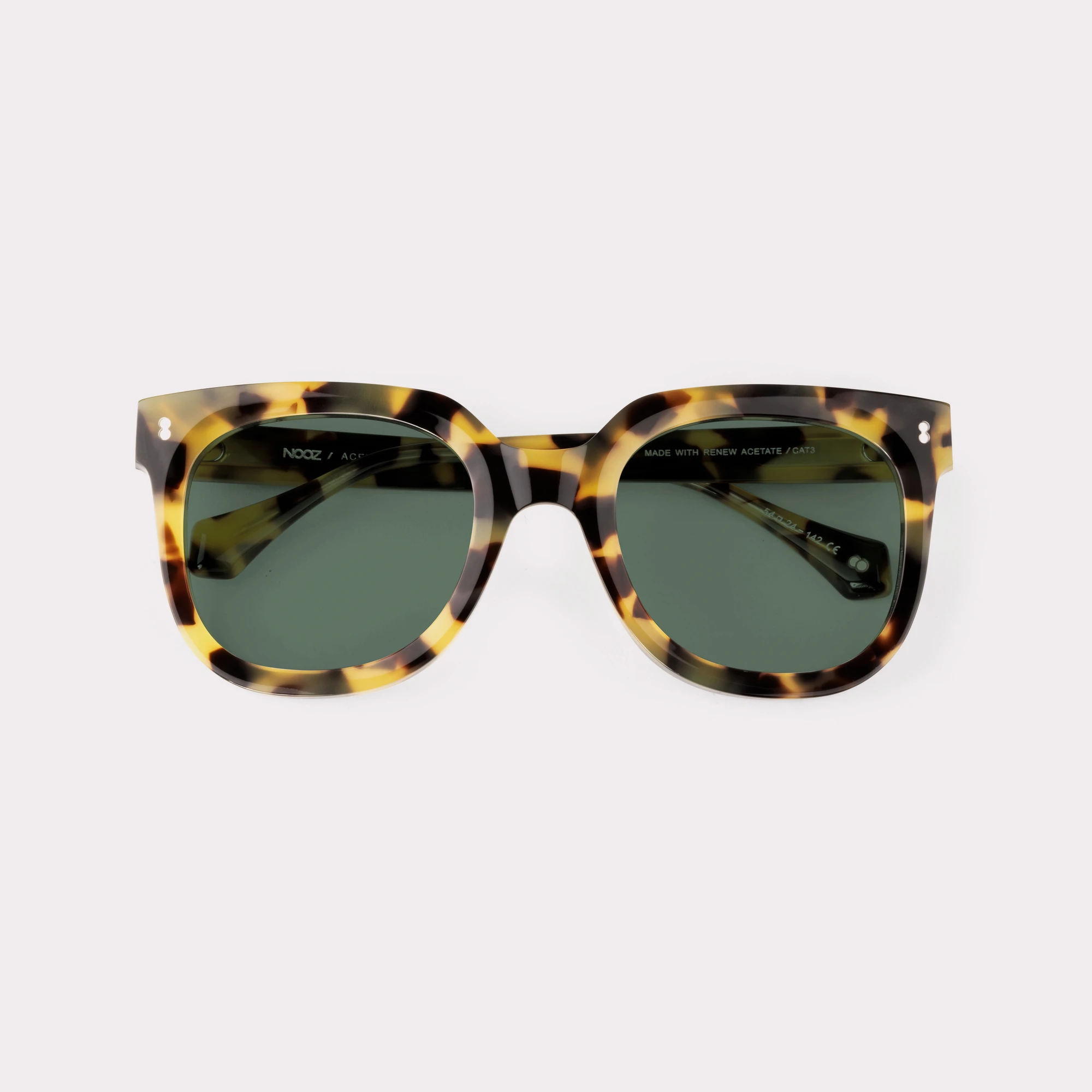 A pair of Sky Brown tortoise Sunglasses folded