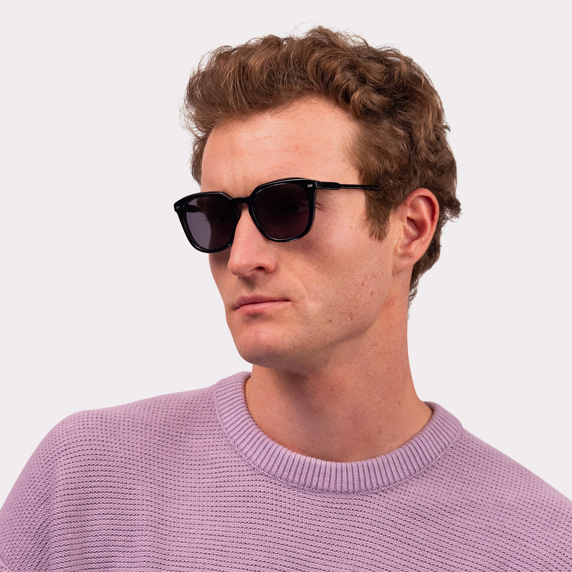 A pair of Clover Black Sunglasses