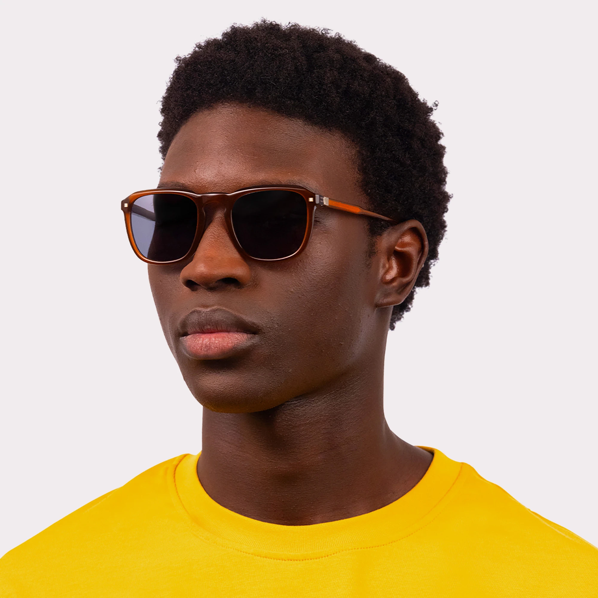 A pair of Carmen Brown Sunglasses
