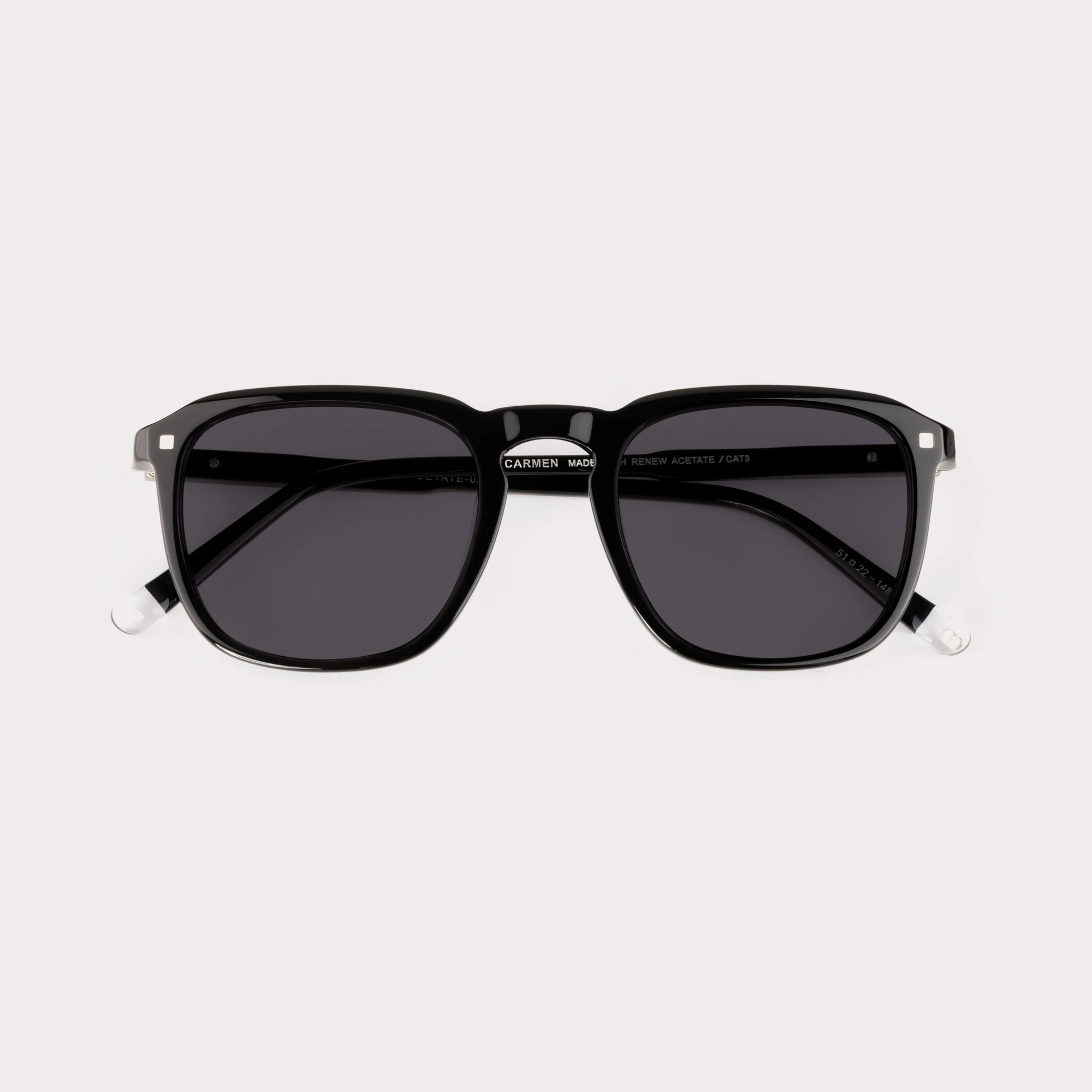 A pair of Carmen Black Sunglasses folded