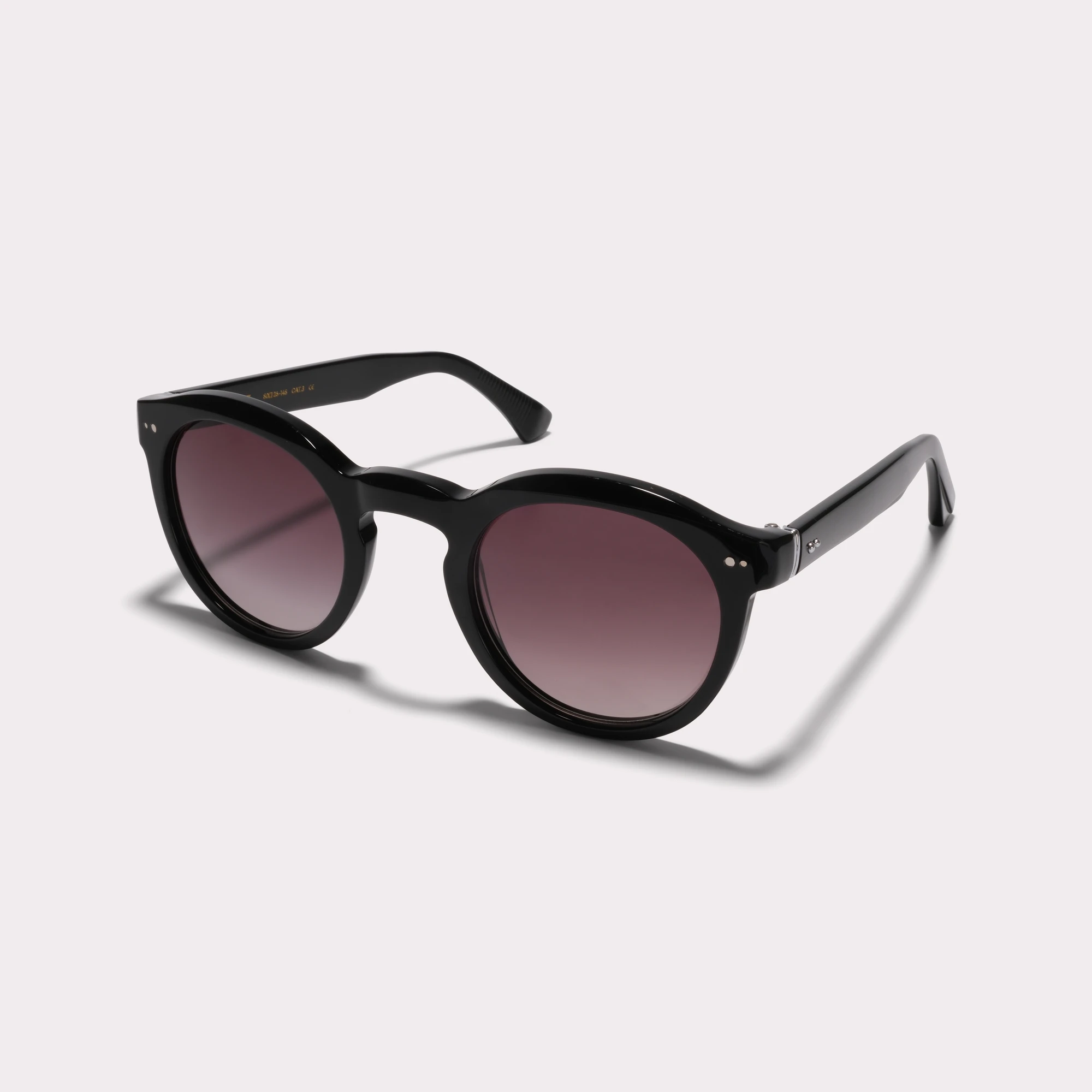 A pair of Robb Black Sunglasses  seen from the side