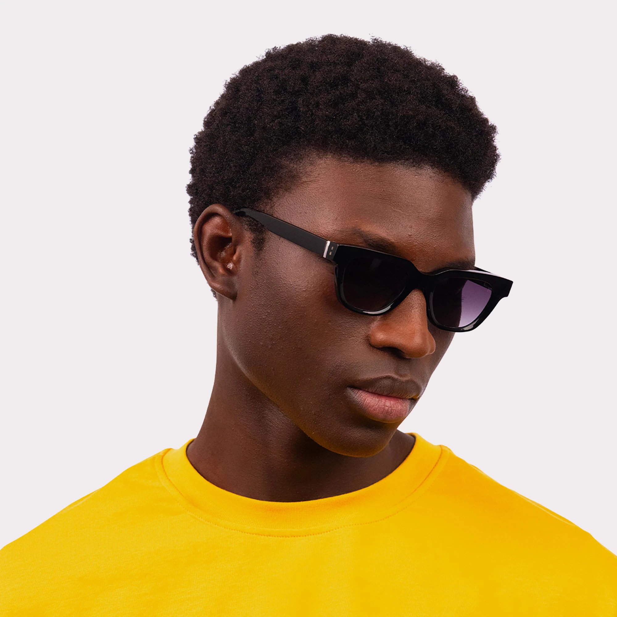 A pair of Eli Black Sunglasses