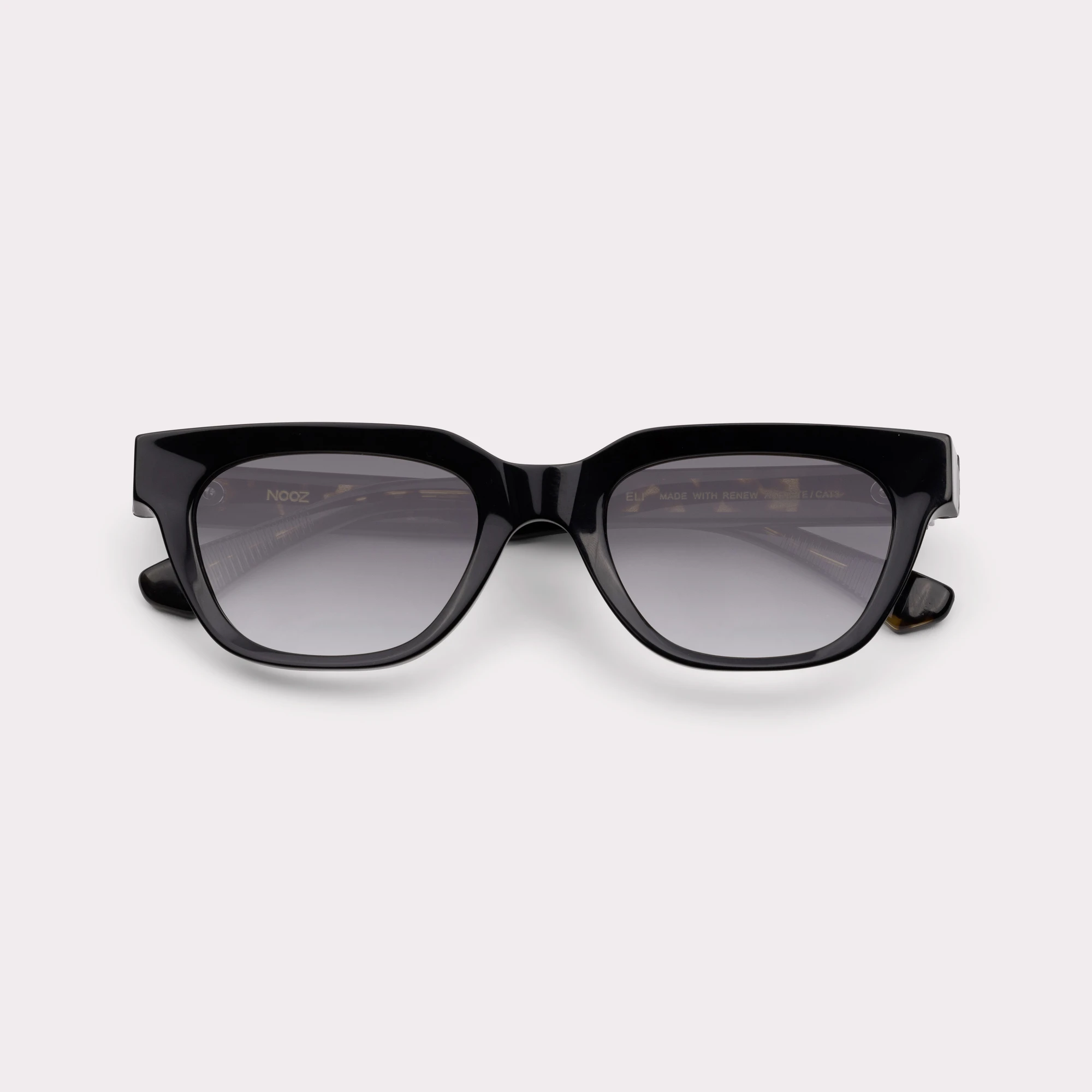 A pair of Eli Black Sunglasses folded