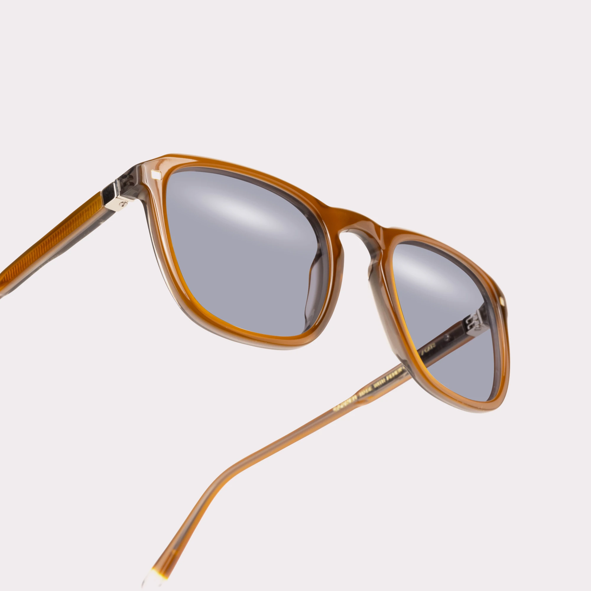 A pair of Carmen Brown Sunglasses in a macro view