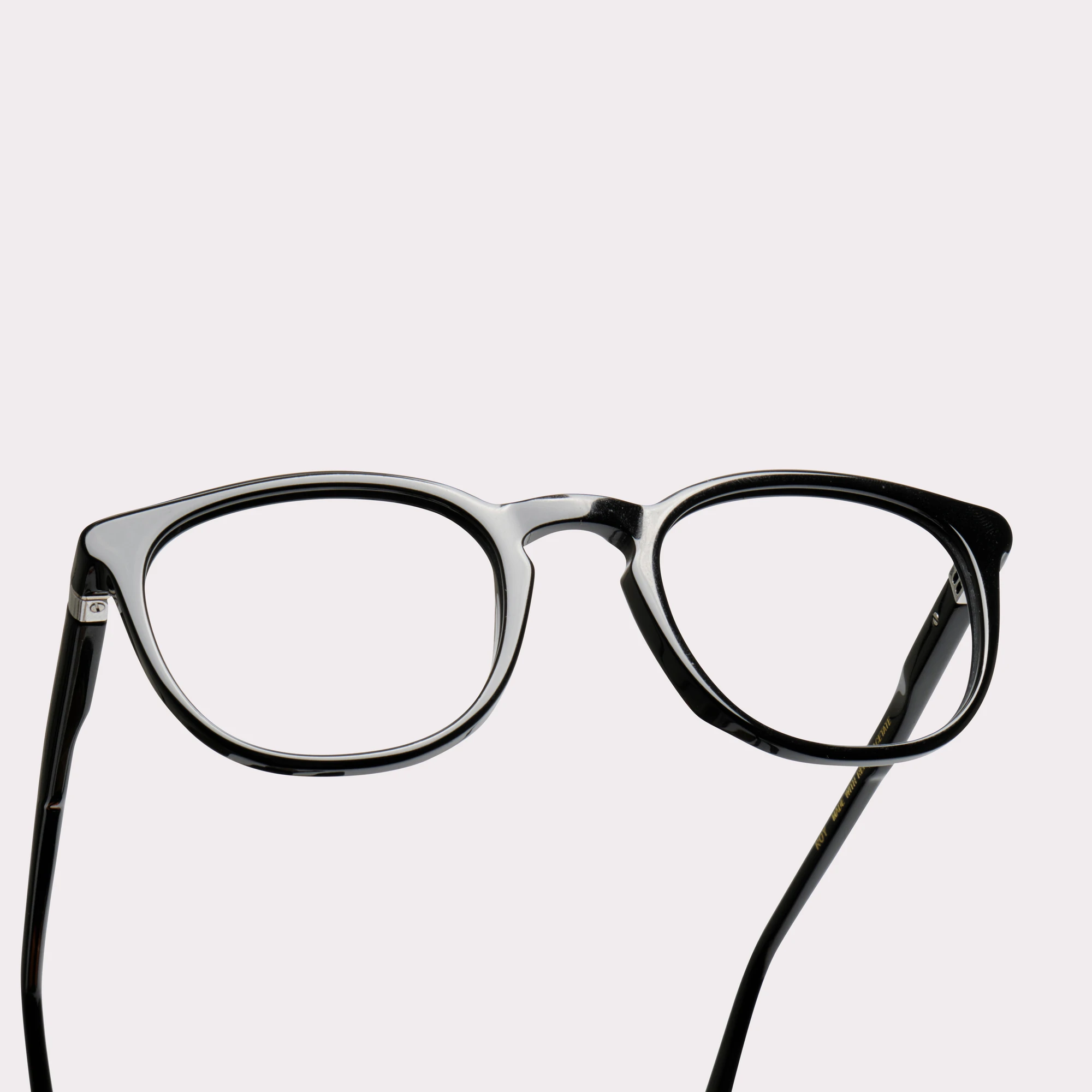 A pair of Roy Black Prescription glasses in a macro view