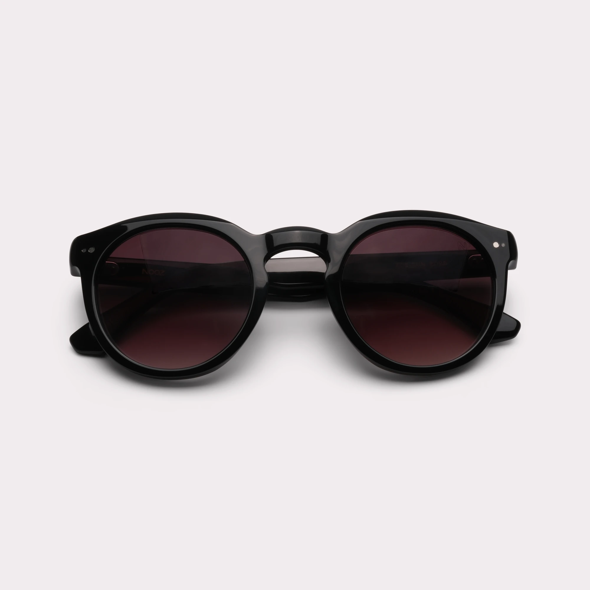 A pair of Robb Black Sunglasses folded