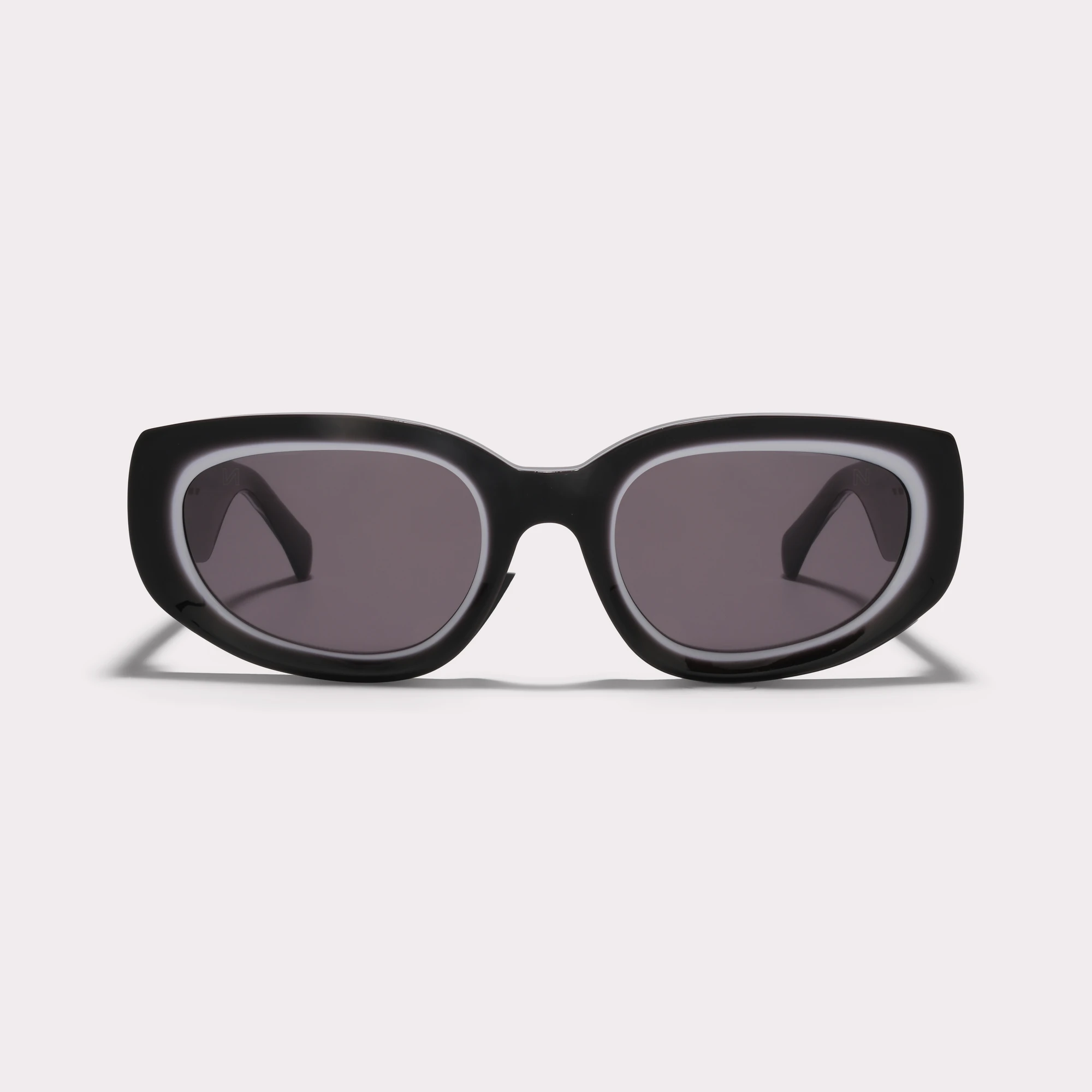A pair of Lola Black Sunglasses seen from the front