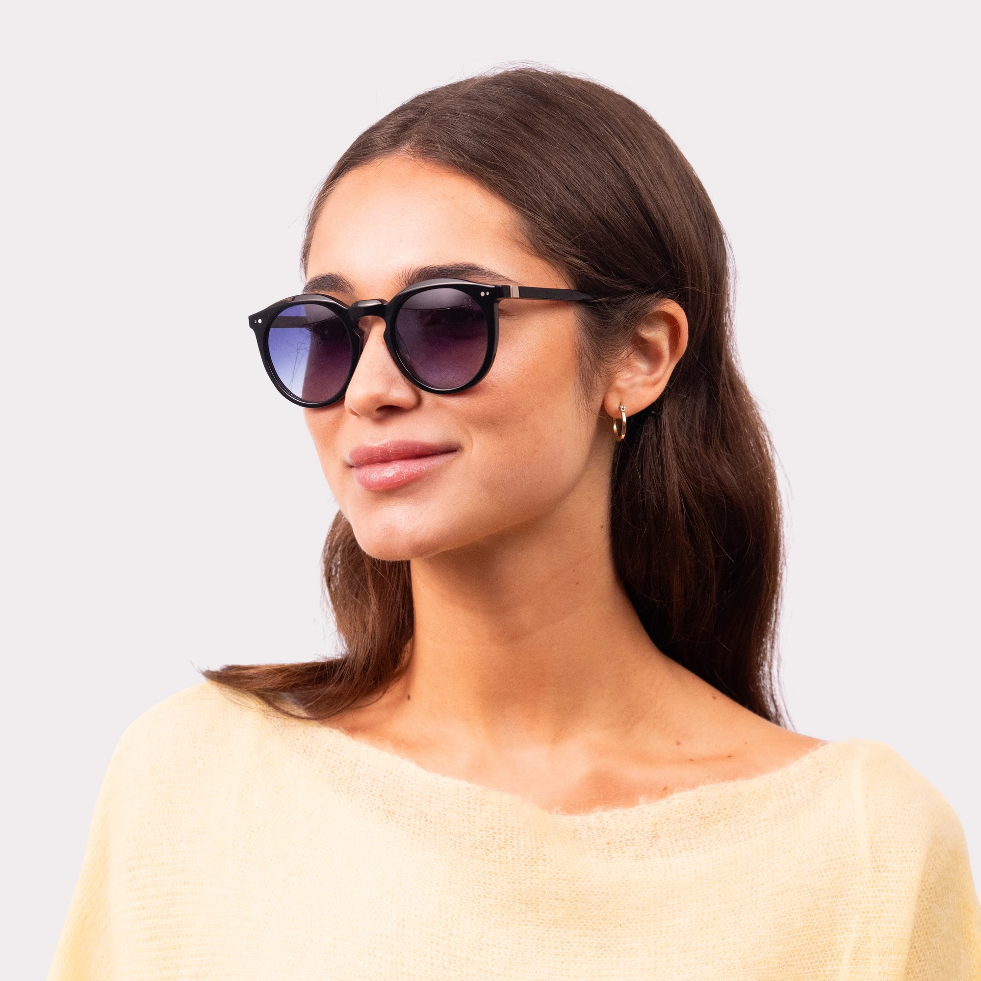 A pair of Robb Black Sunglasses