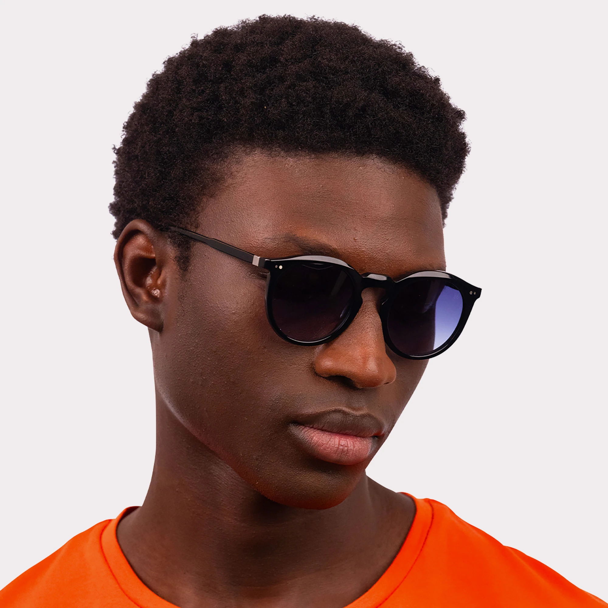 A pair of Robb Black Sunglasses