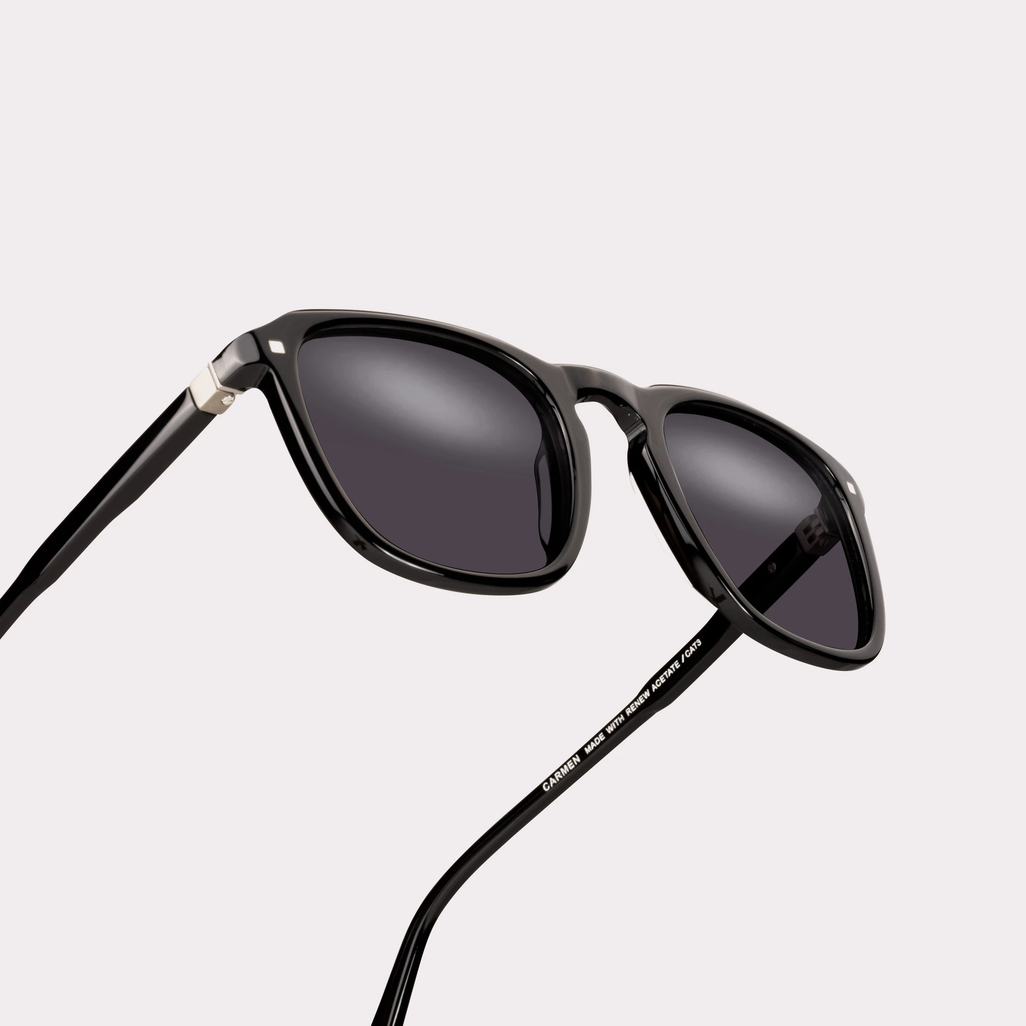A pair of Carmen Black Sunglasses in a macro view