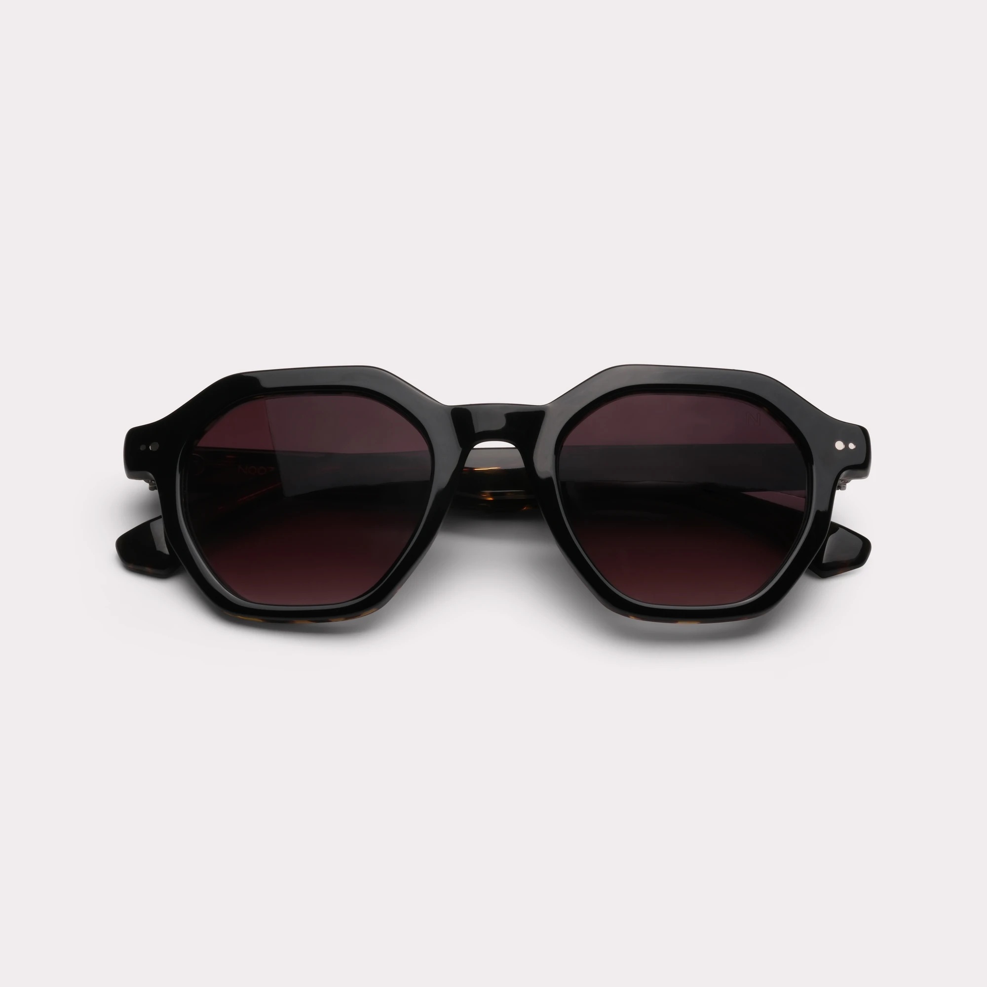 A pair of Milton Black Sunglasses folded