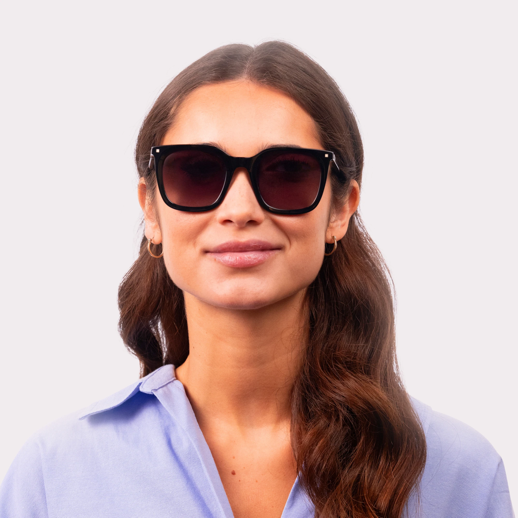 A pair of Candid Black Sunglasses