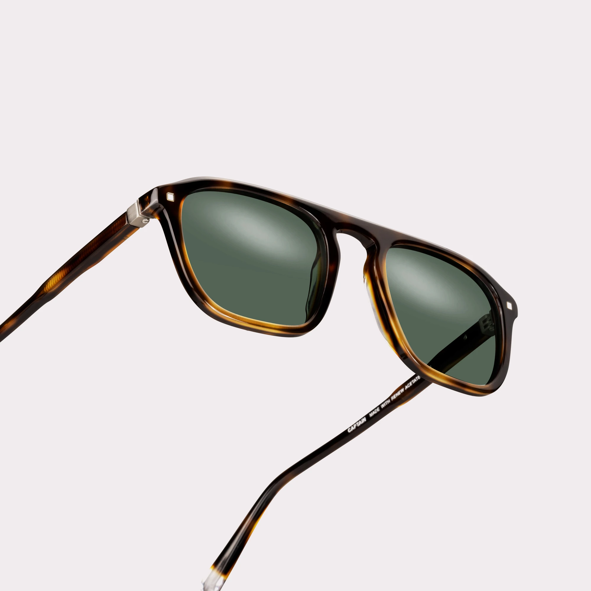 A pair of Captain Tortoise Sunglasses in a macro view
