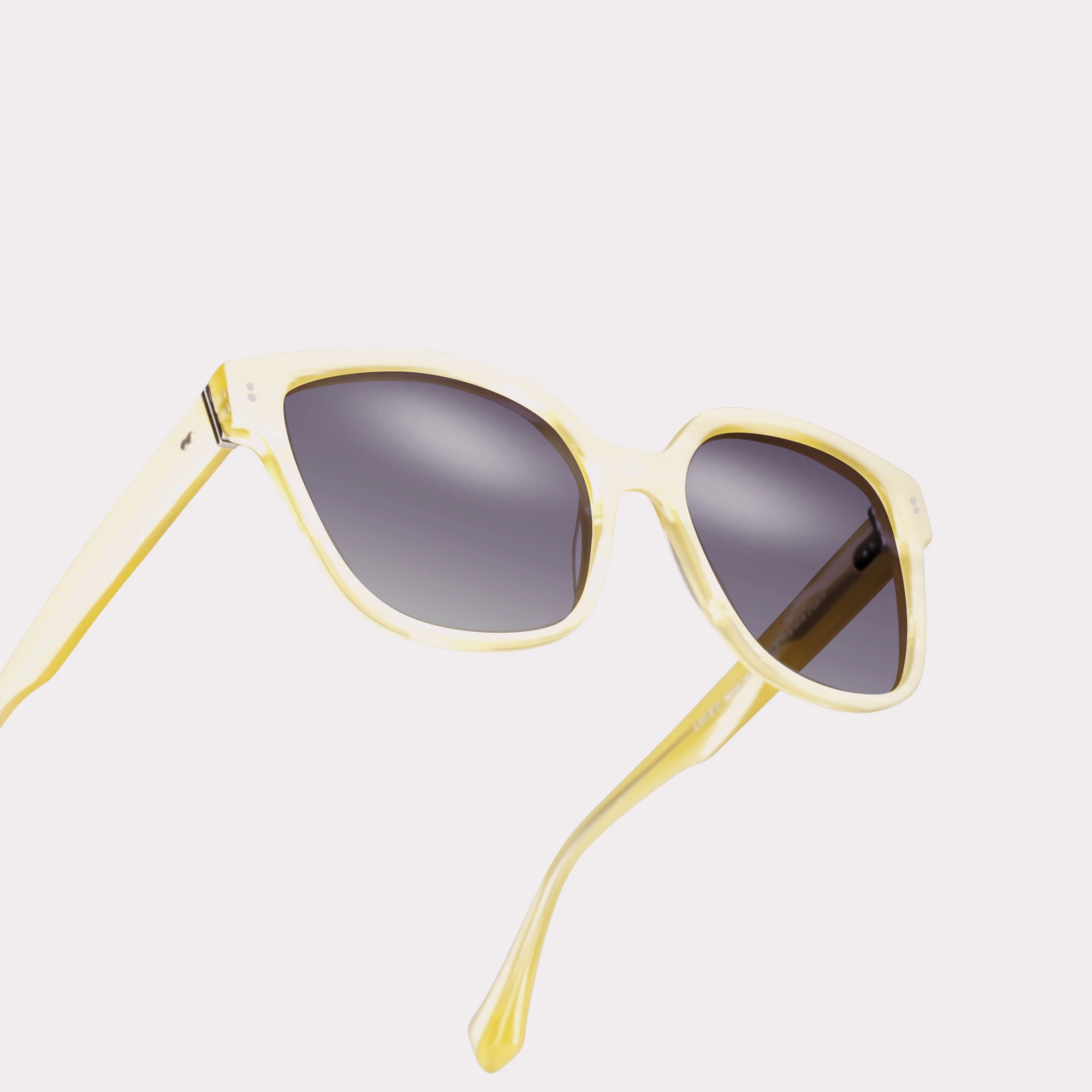 A pair of Lucky Milky Beige Sunglasses in a macro view