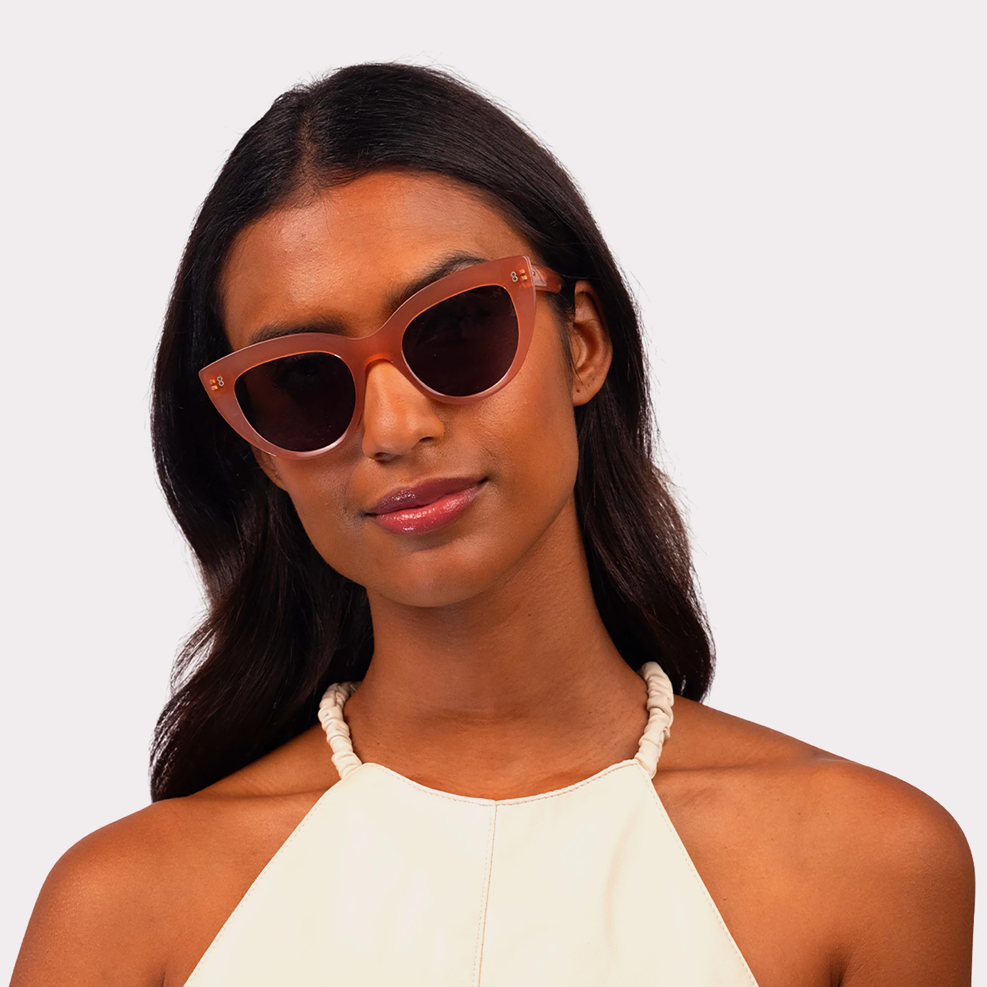A pair of Romy Milky Pink Sunglasses