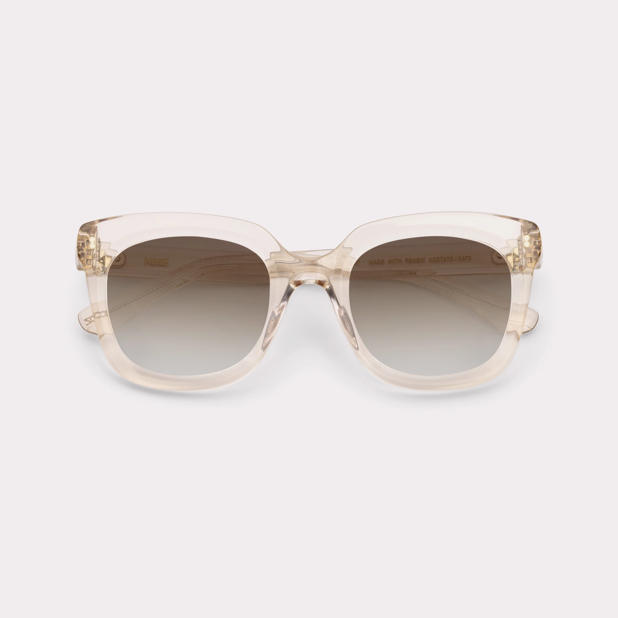 A pair of Sky Champagne Sunglasses folded
