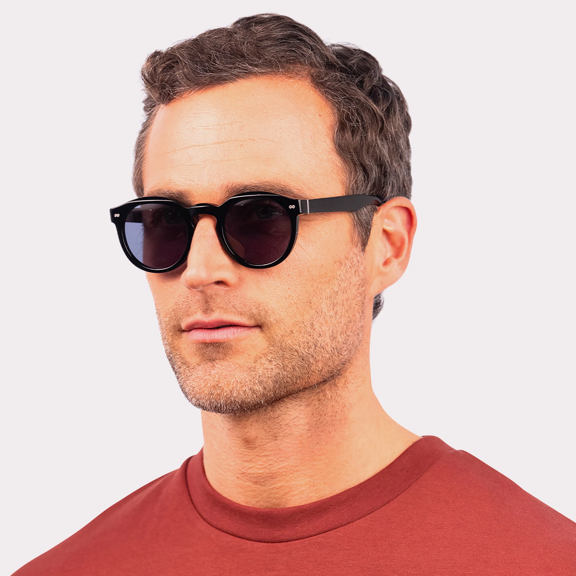 A pair of Robb Black Sunglasses