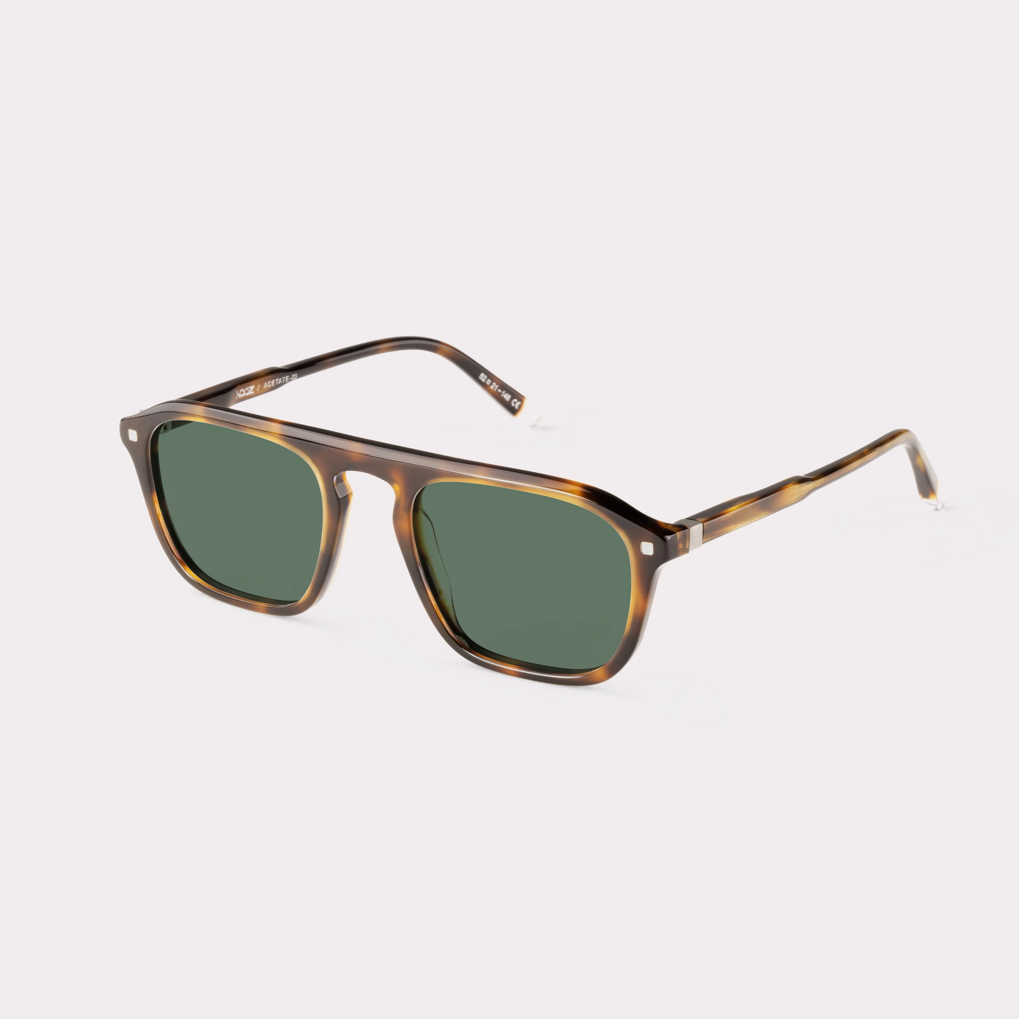 A pair of Captain Tortoise Sunglasses  seen from the side
