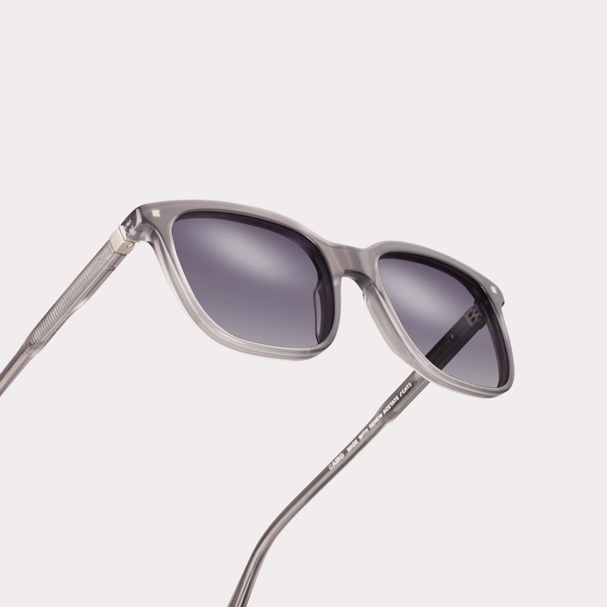 A pair of Cairo Grey Sunglasses in a macro view