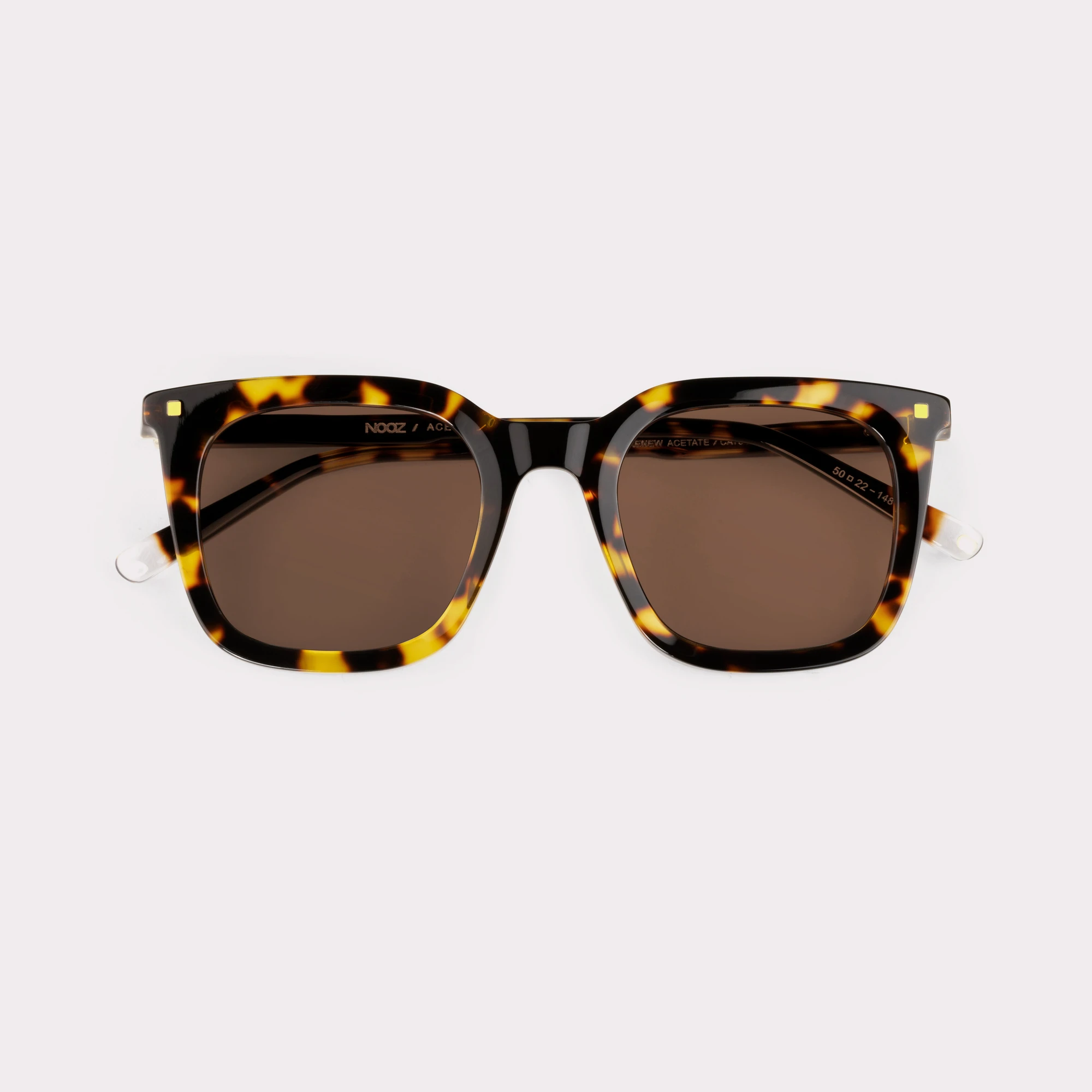 A pair of Candid Dark tortoise Sunglasses folded