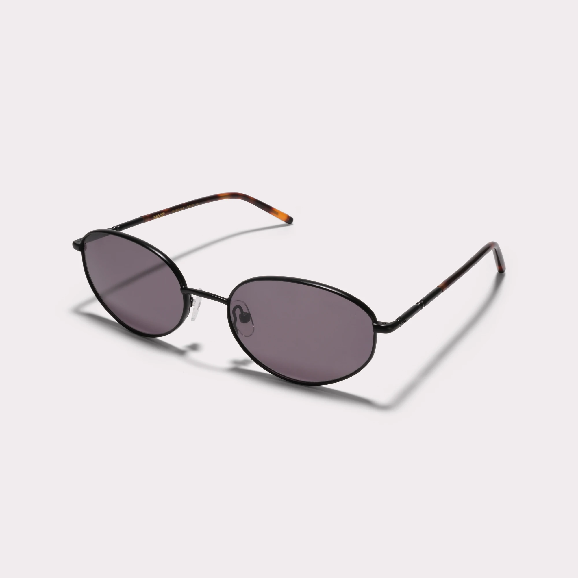 A pair of Dean Black Sunglasses  seen from the side