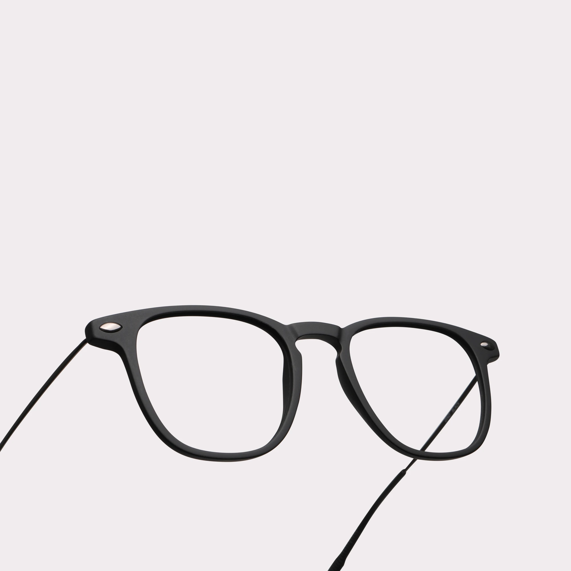 A pair of Doni Black Blue light glasses in a macro view