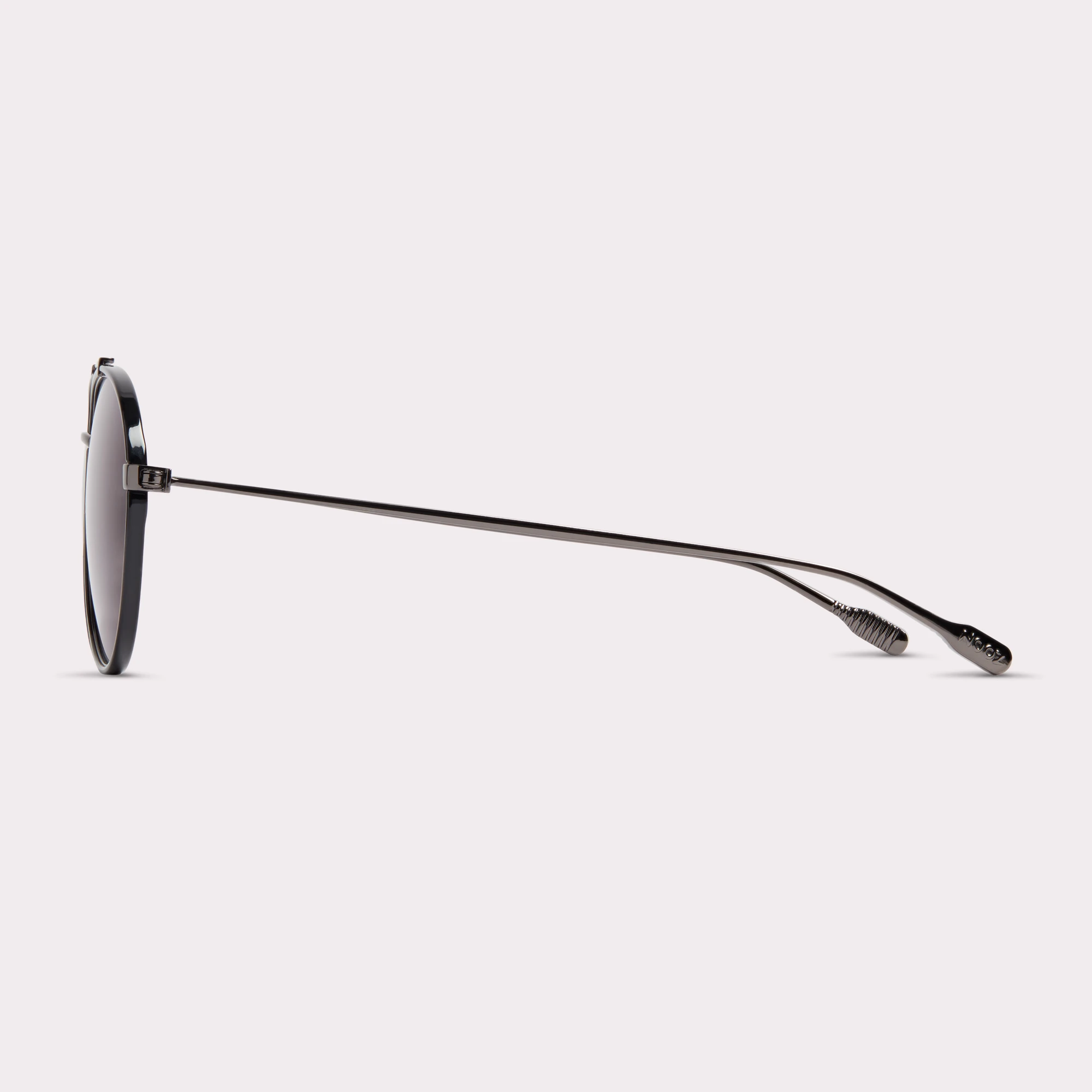 A pair of Jet Black Sunglasses  seen from the side