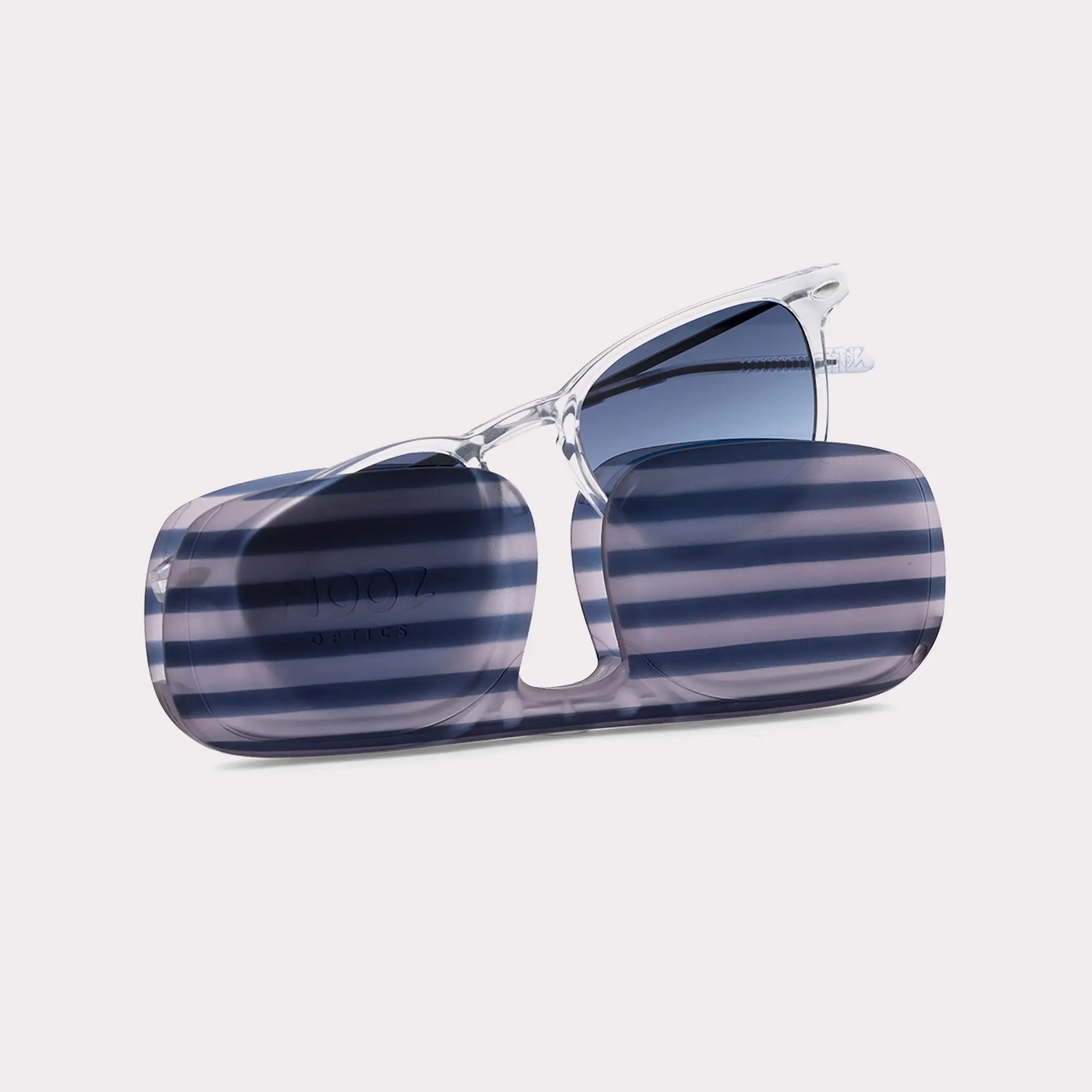 A pair of Case - Doni Essential Demi-Blue Accessories coming out of its case