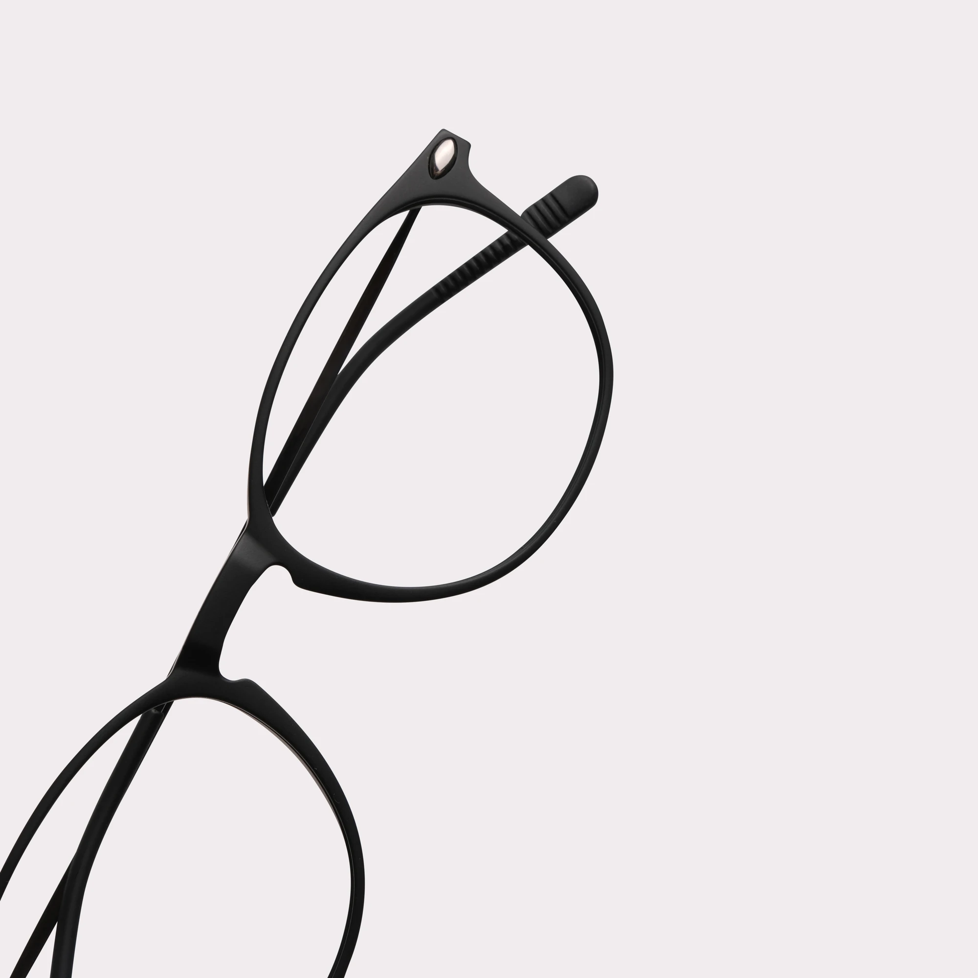 A pair of Alba Black Reading glasses in a macro view