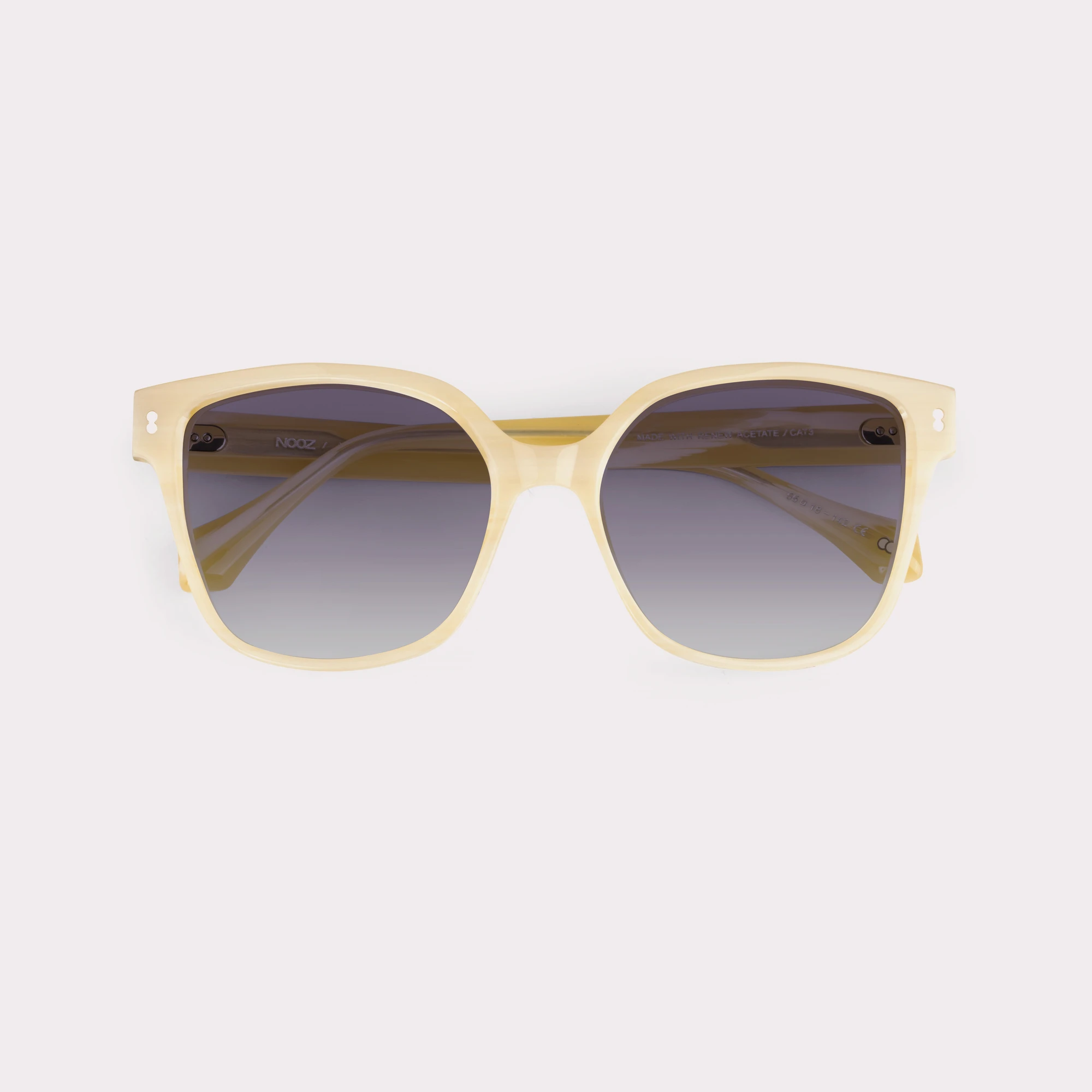 A pair of Lucky Milky Beige Sunglasses folded