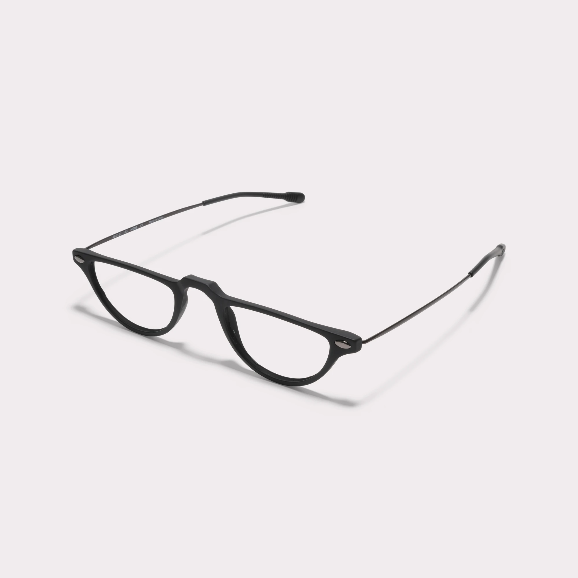 A pair of Moon Black Reading glasses  seen from the side