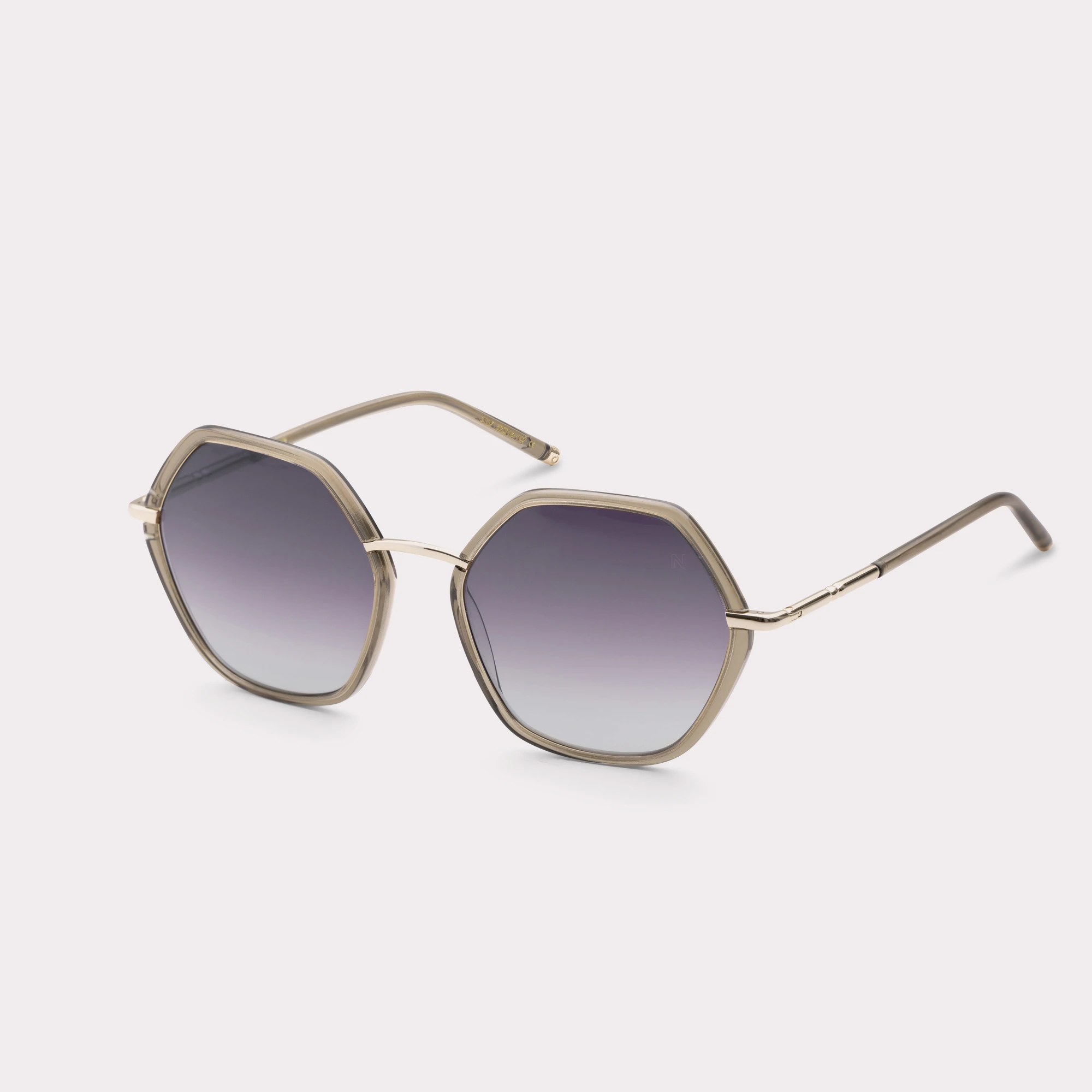 A pair of Pearl Olive Sunglasses  seen from the side