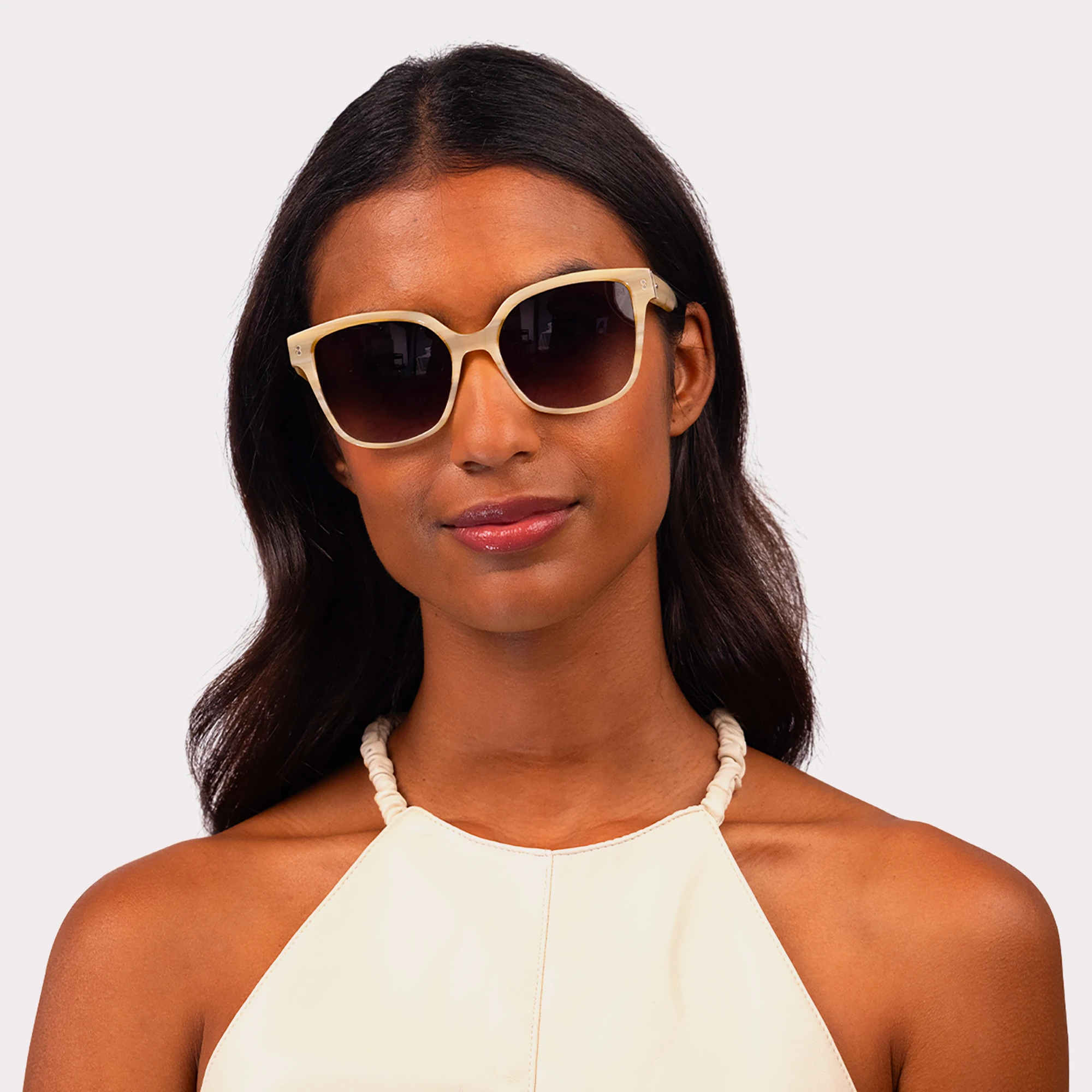 A pair of Lucky Milky Beige Sunglasses