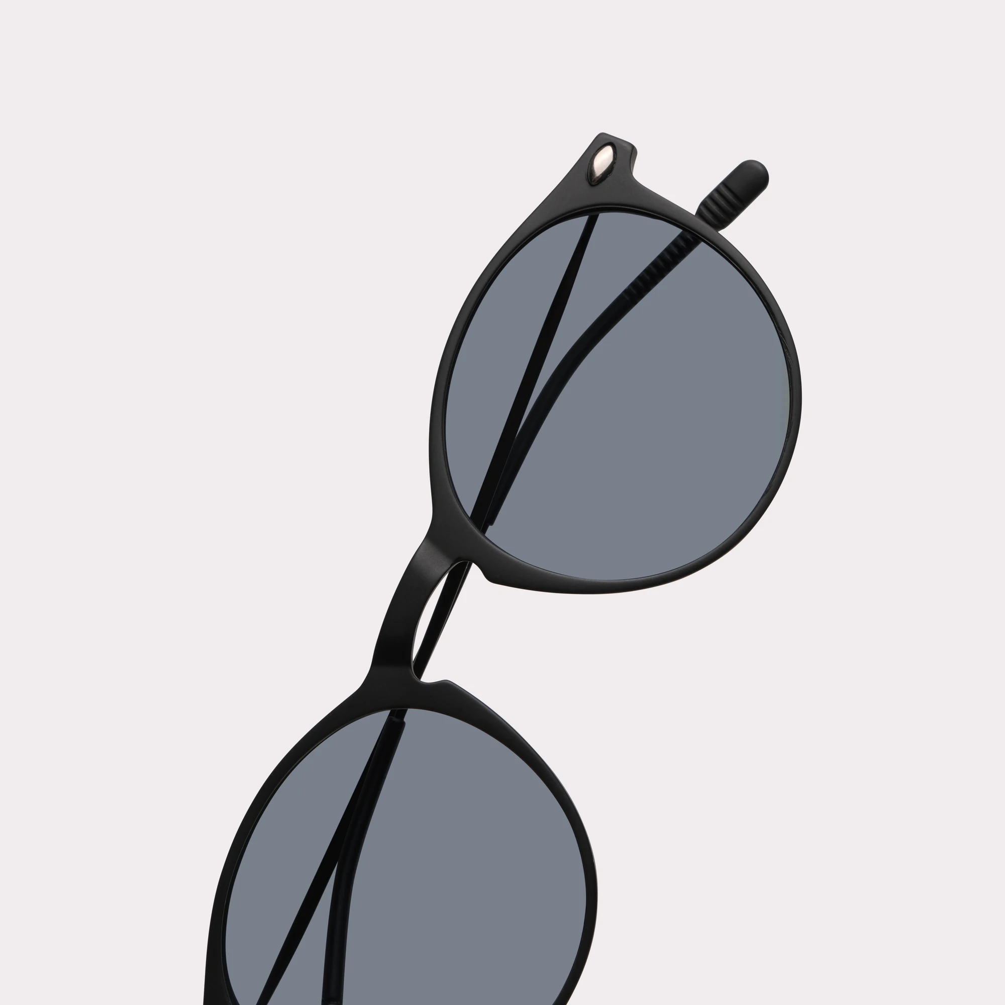 A pair of Cruz Black Sunglasses in a macro view