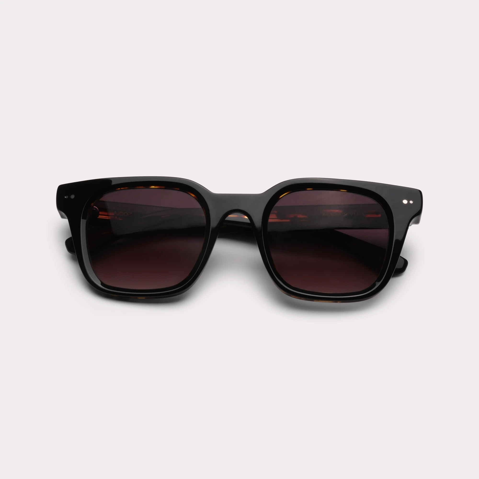A pair of Vega Black Sunglasses folded