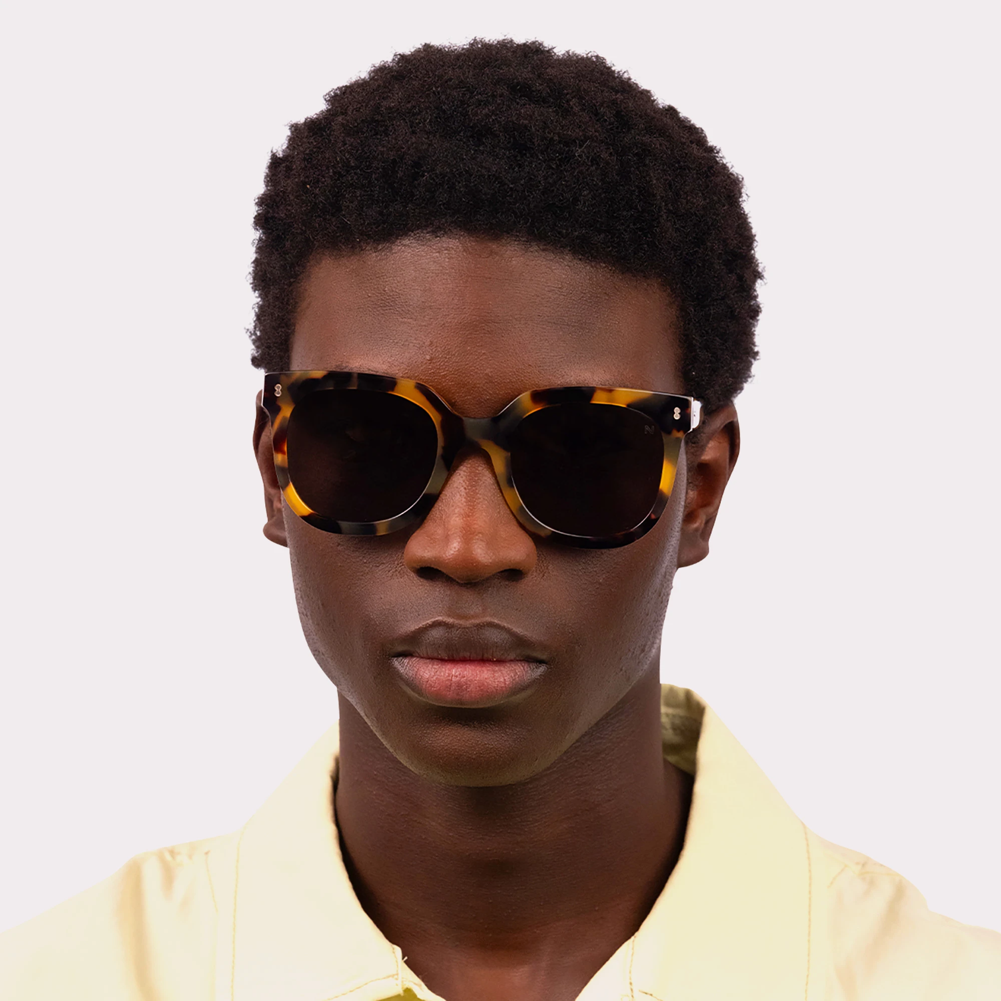 A pair of Sky Brown tortoise Sunglasses