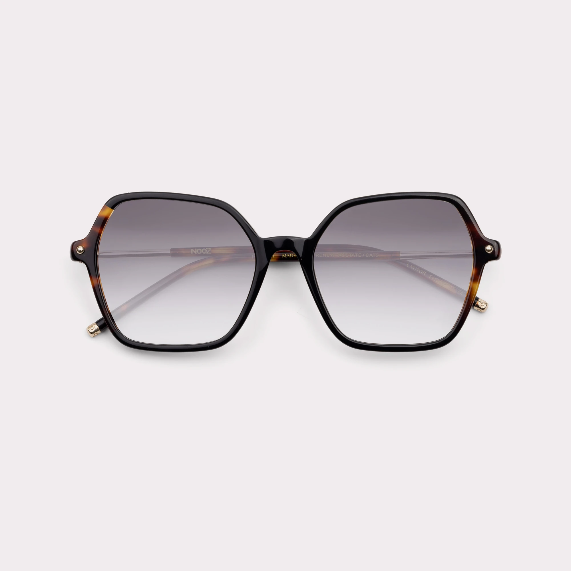 A pair of Peach Tortoise Sunglasses folded